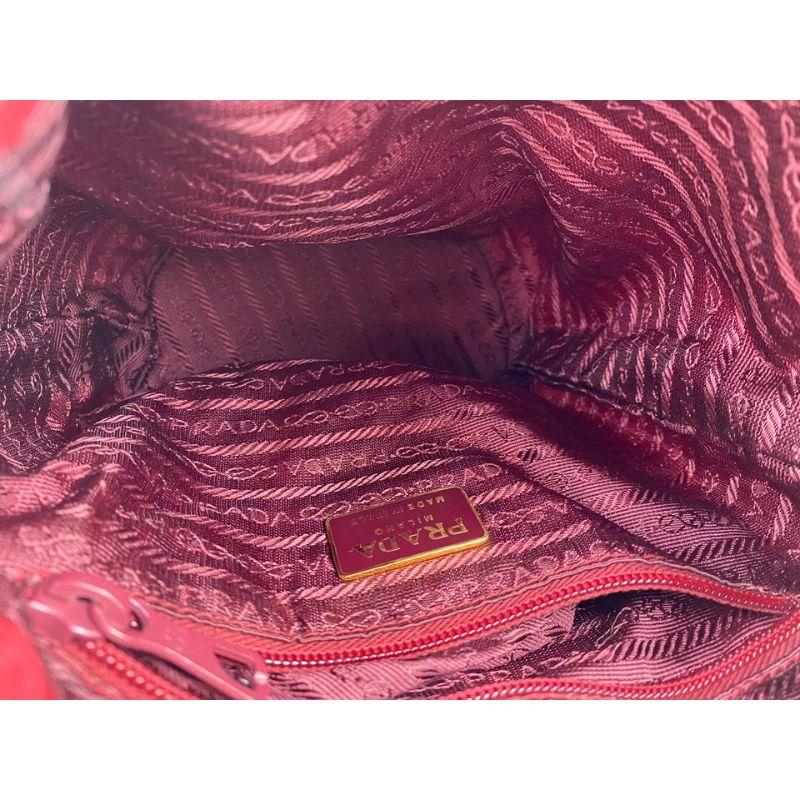 red snakeskin prada bag