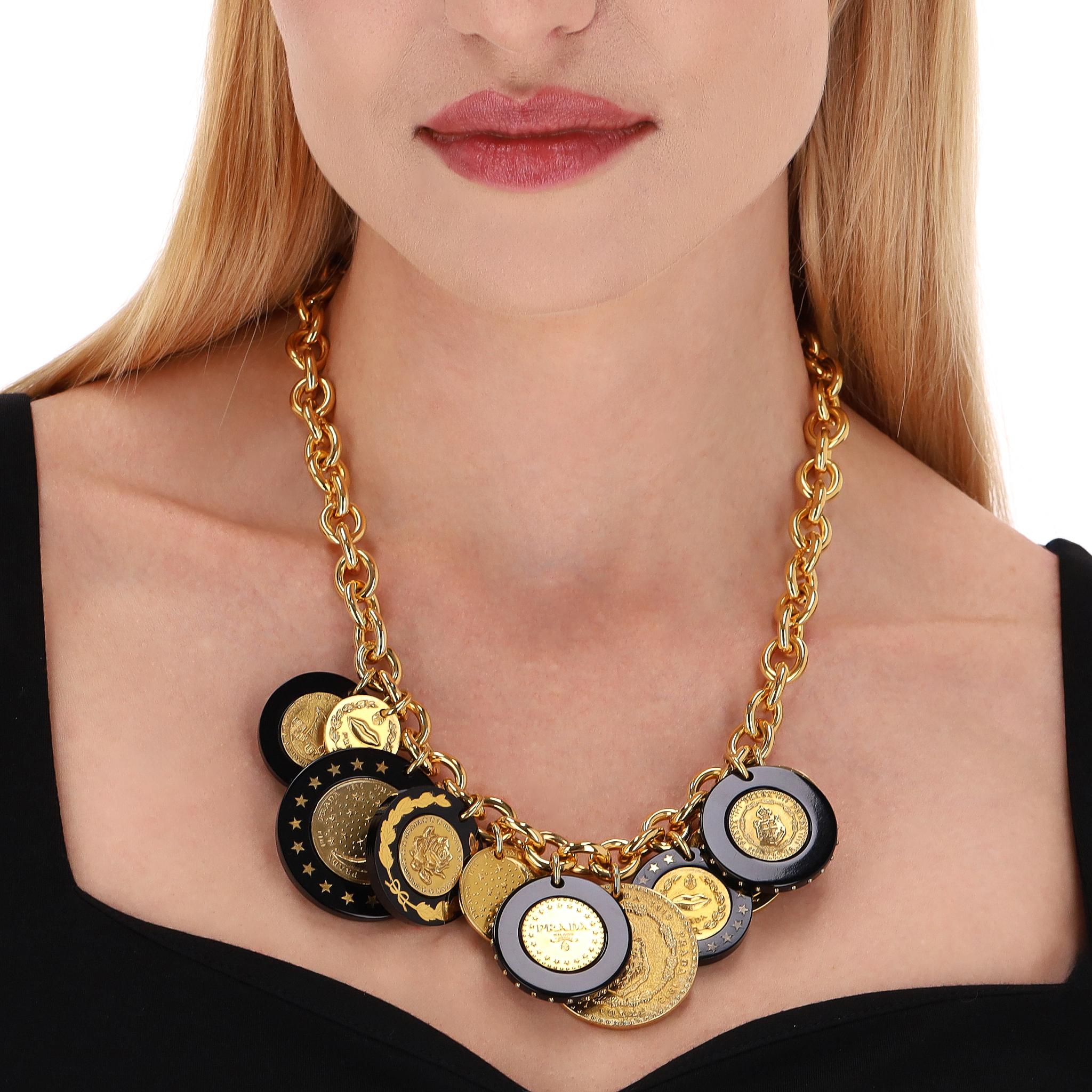 Prada Resin Medallion Chain Necklace

This statement necklace is designed with multiple oversized gold medallions, some of which are adorned with a black resin border.

The medallions are engraved with Prada signature designs and wordings. 

Chunky