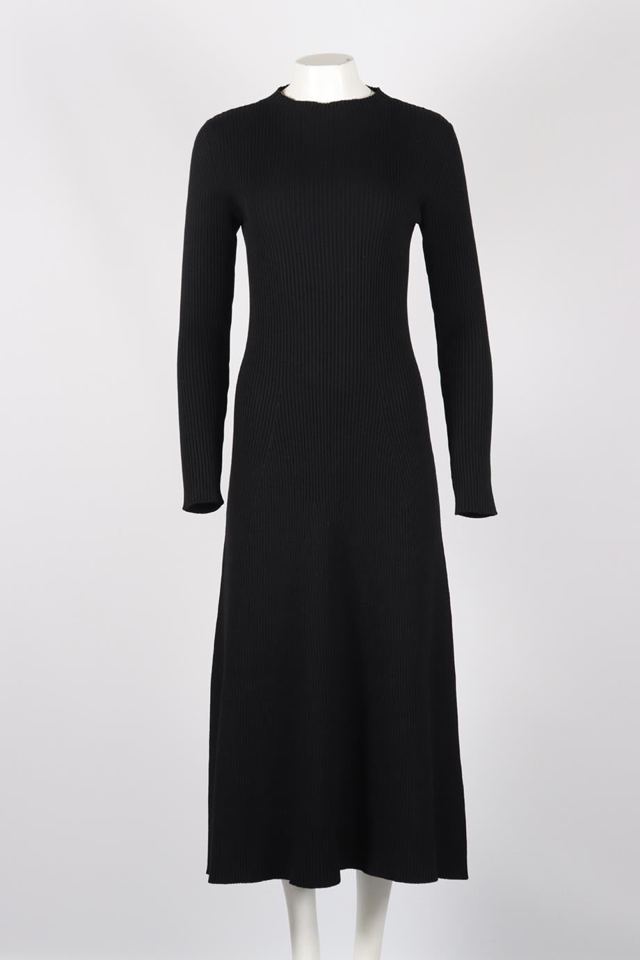 Prada Ribbed Wool Blend Midi Dress. Black. Long Sleeve. Mock Neck. Slips on. No composition label. Large (UK 12, US 8, FR 40, IT 44). Bust: 34 in. Waist: 30 in. Hips: 46 in. Length: 50 in. Condition: Used. Very good condition - Size and composition