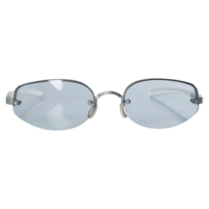 Prada, randlose Sonnenbrille aus Metall und Kunststoff