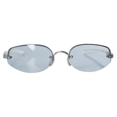 Prada, rimless metal and plastic sunglasses