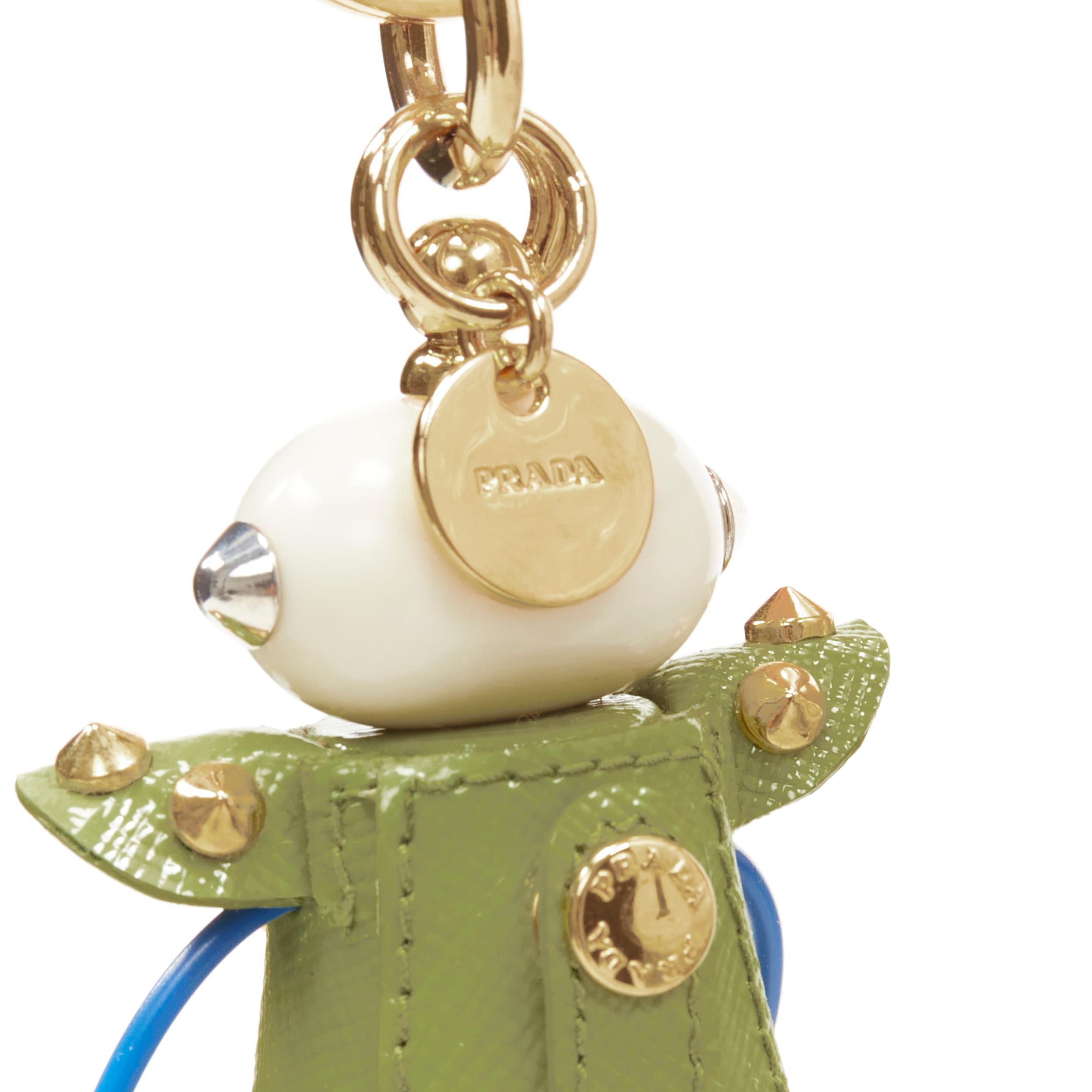 PRADA Robot green saffiano leather gold studded bolts hardware keyring bag charm 
Reference: ANWU/A00112 
Brand: Prada 
Designer: Miuccia Prada 
Collection: Robot 
Material: Leather 
Color: Green 
Pattern: Solid 
Closure: Lobster 
Extra Detail:
