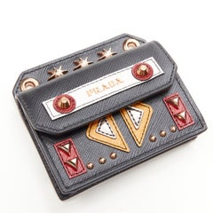 PRADA Robot Stereo black saffiano studded flap cardholder bag charm