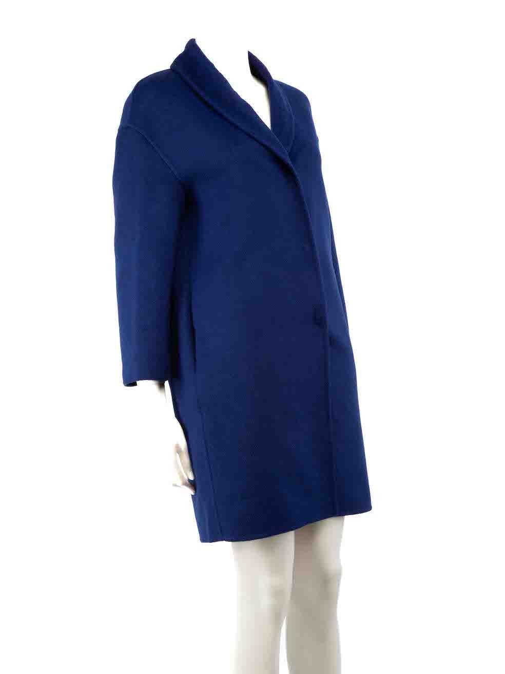 CONDITION is Very good. Minimal wear to coat is evident. Minimal wear to coat is seen with two small discolouration marks on the collar in the front on this used Prada designer resale item.
 
 
 
 Details
 
 
 Blue
 
 Wool
 
 Coat
 
 Single