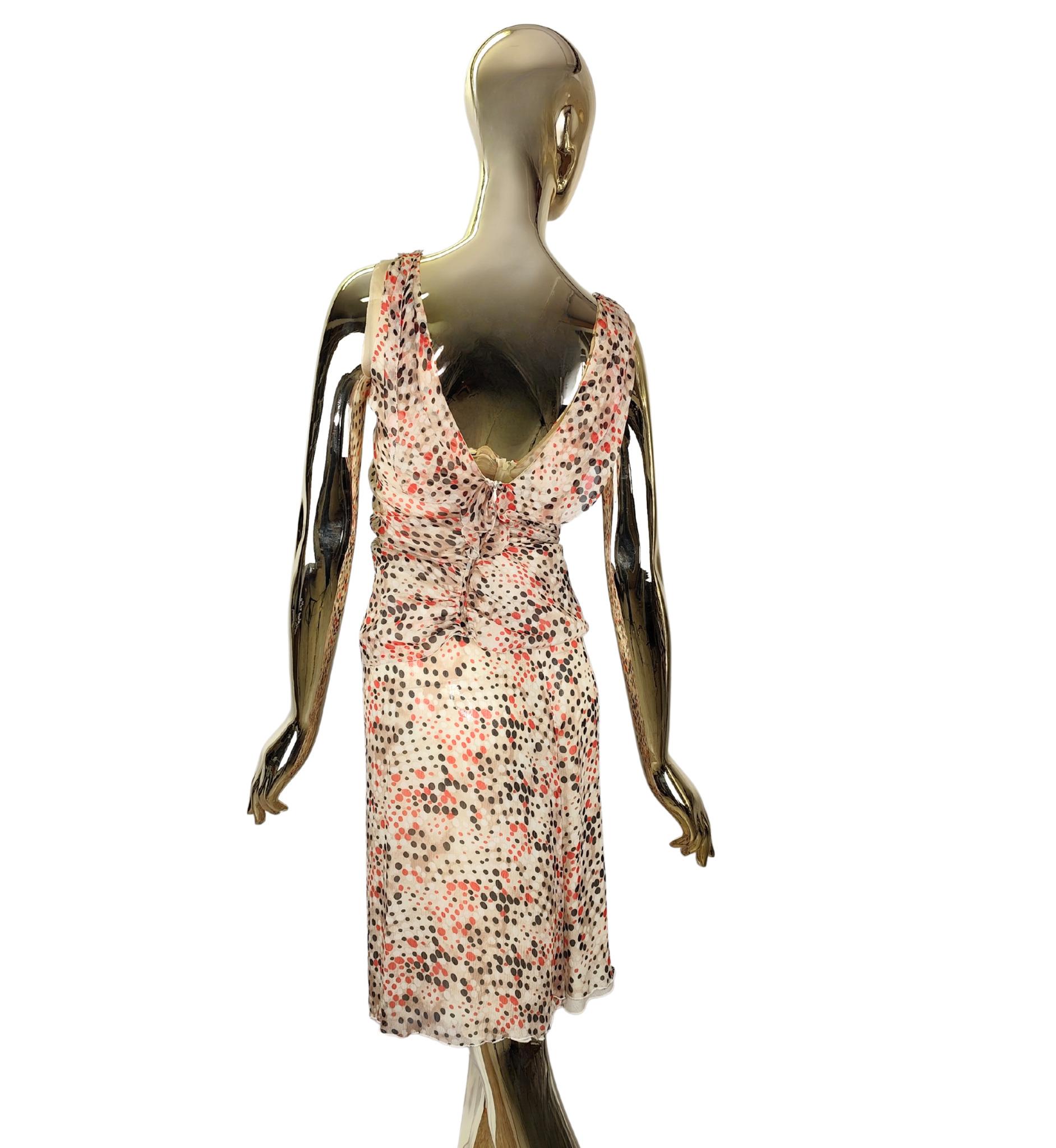 Prada ruched top and skirt set
Multicolor polkadot print on cream silk
Zipper closure

Top marked size 42 IT
Skirt marked size 40 IT

Top measurements:
bust 84 cm - 33 in
waist 70 cm - 27.5 in
hips 86 cm - 34 in 
length 56 cm - 22 in

Skirt