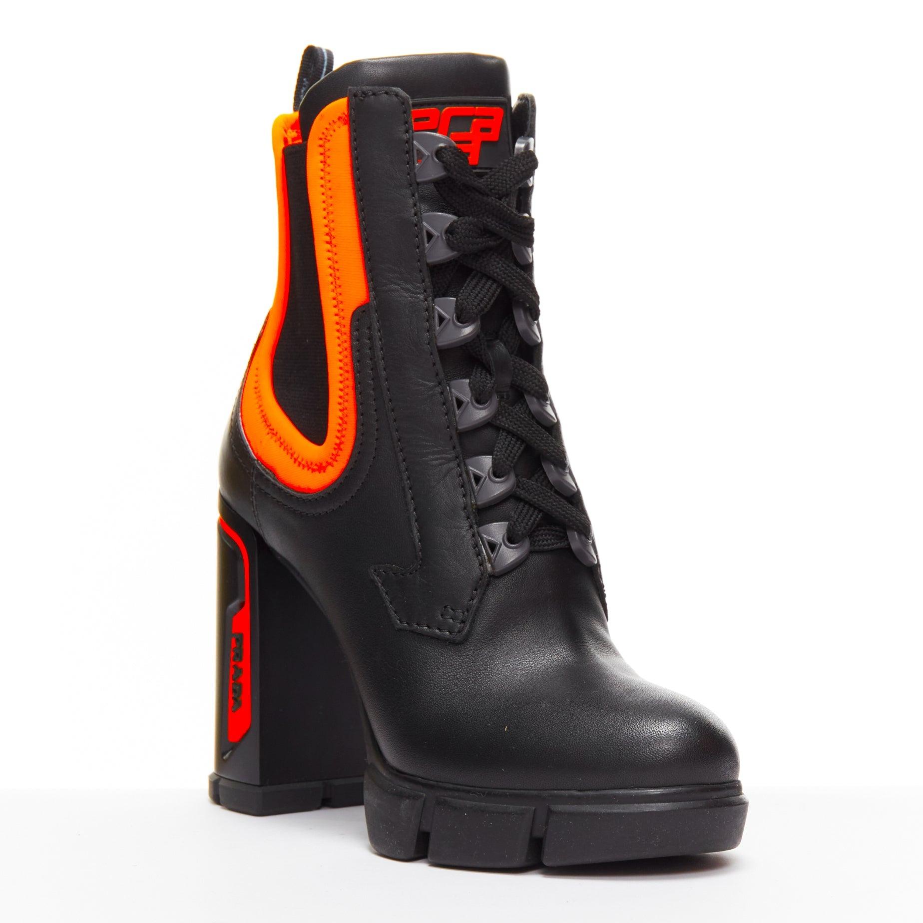 Black PRADA Runway neon orange neoprene black leather logo boots EU37 Nicki Minaj For Sale