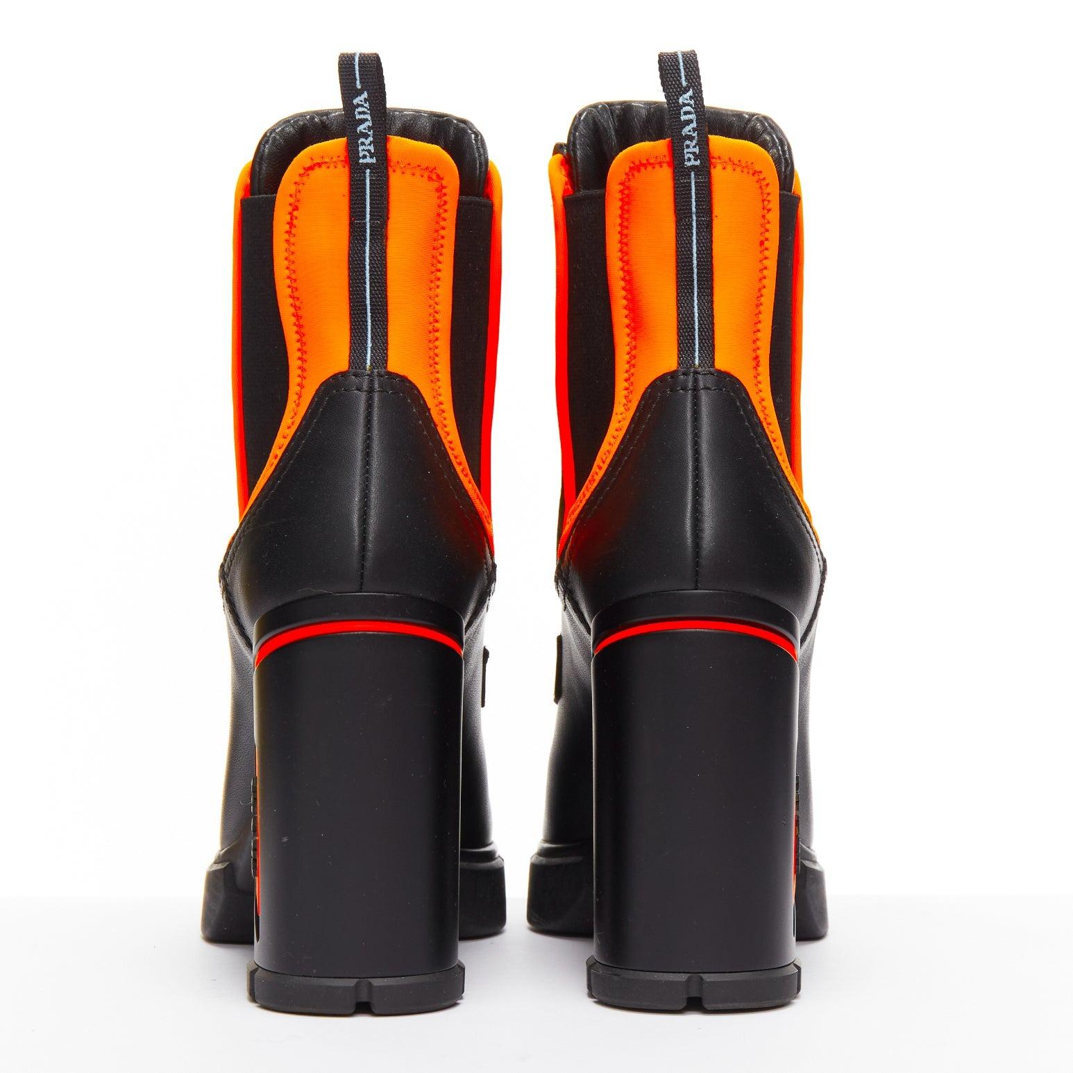 PRADA Runway néon orange néoprène noir cuir logo bottes EU37 Nicki Minaj en vente 1