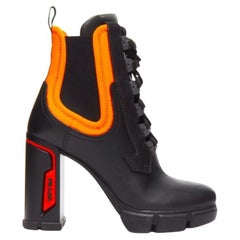 PRADA Pasarela neón naranja neopreno negro cuero logo botas EU37 Nicki Minaj