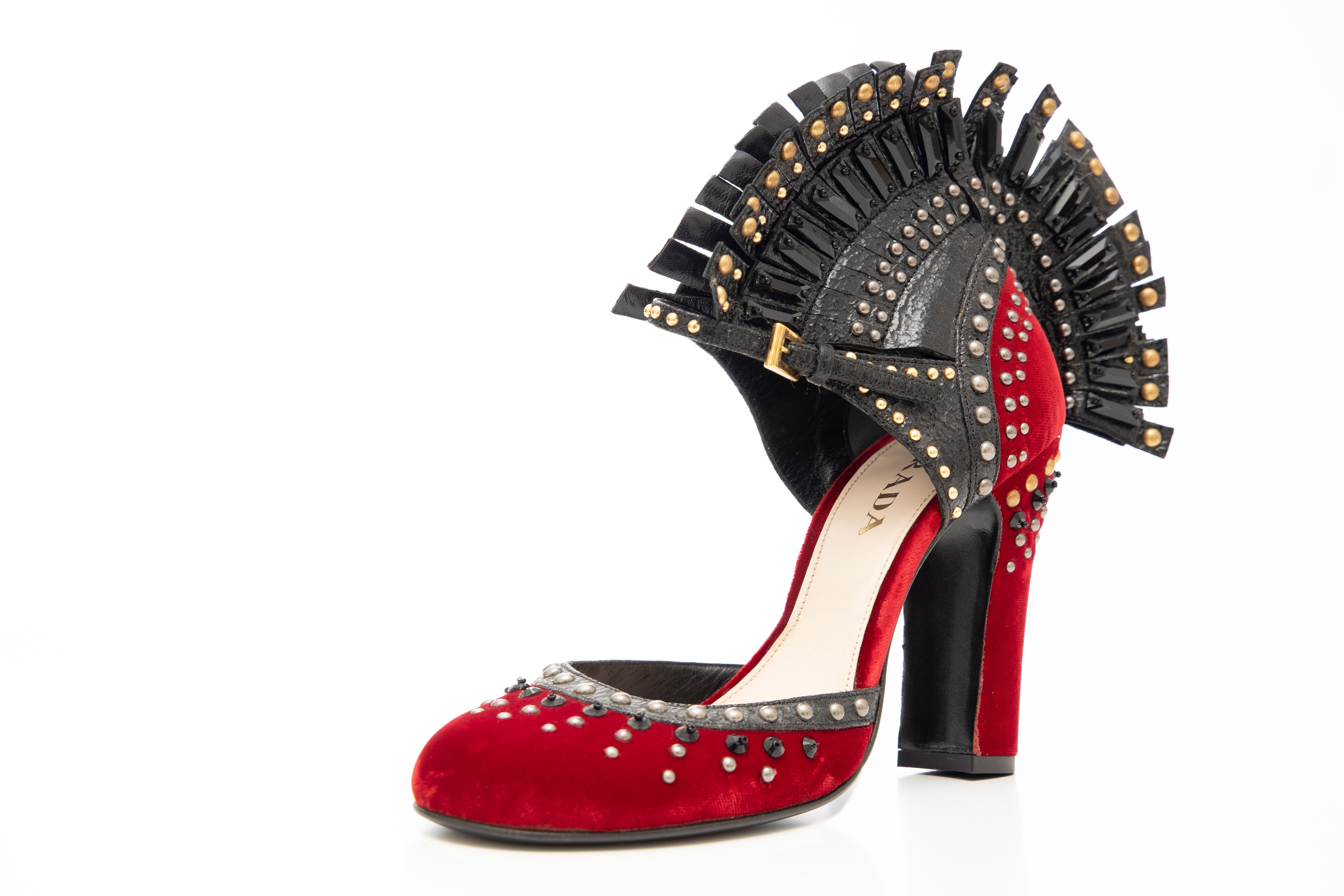 Prada, Runway Fall 2009. red studded velvet with black studded faceted crystal, fringe leather, round toe ankle strap mohawk pumps.

IT. 37, US. 7
Heels: 4.25