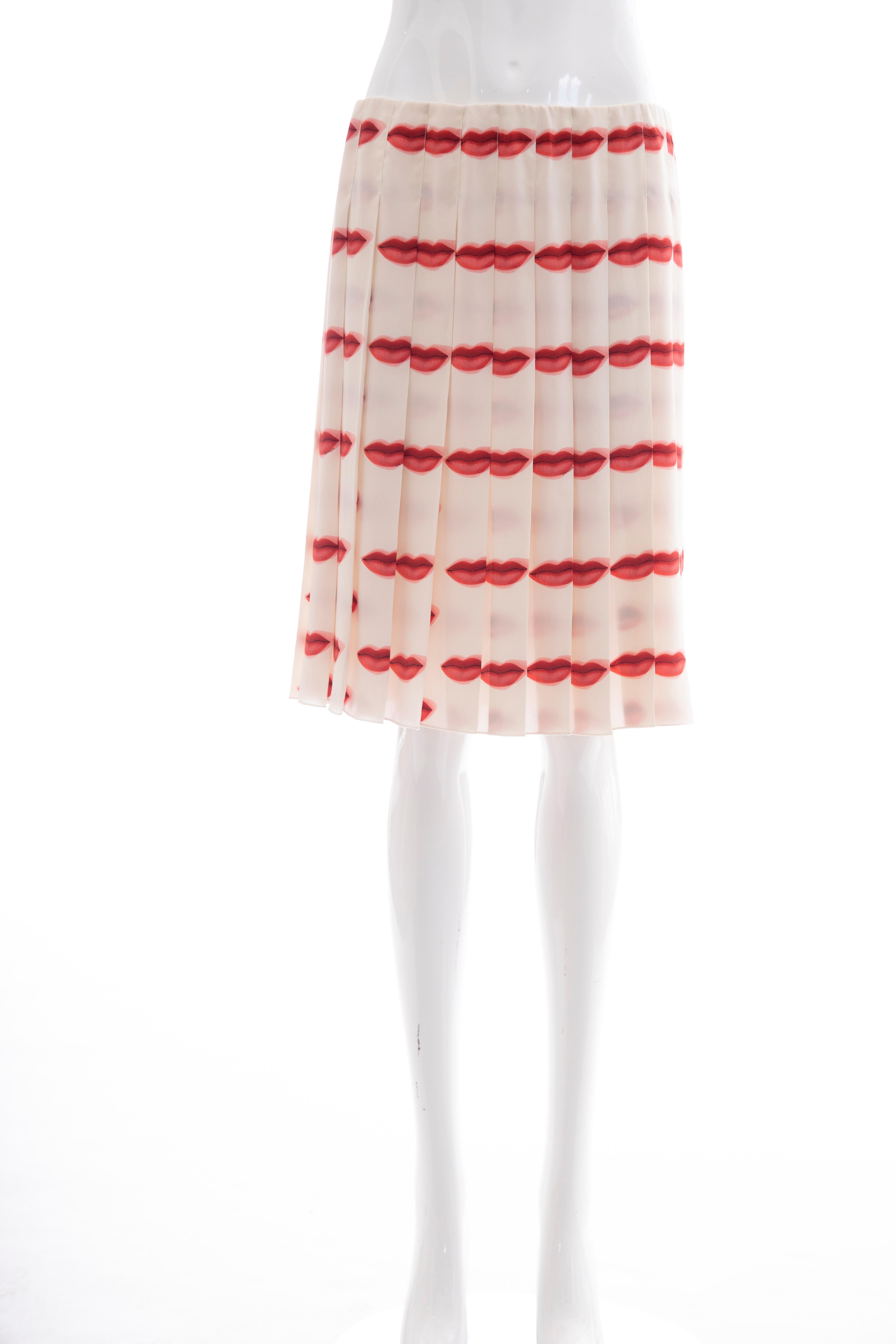 Prada Runway, Spring-Summer 2000, silk skirt with lip print throughout, grosgrain waistband, top stitch pleating and hidden side snap closures.

Featured in the exhibition “Schiaparelli & Prada: impossible conversations” (2012) at the Met in New