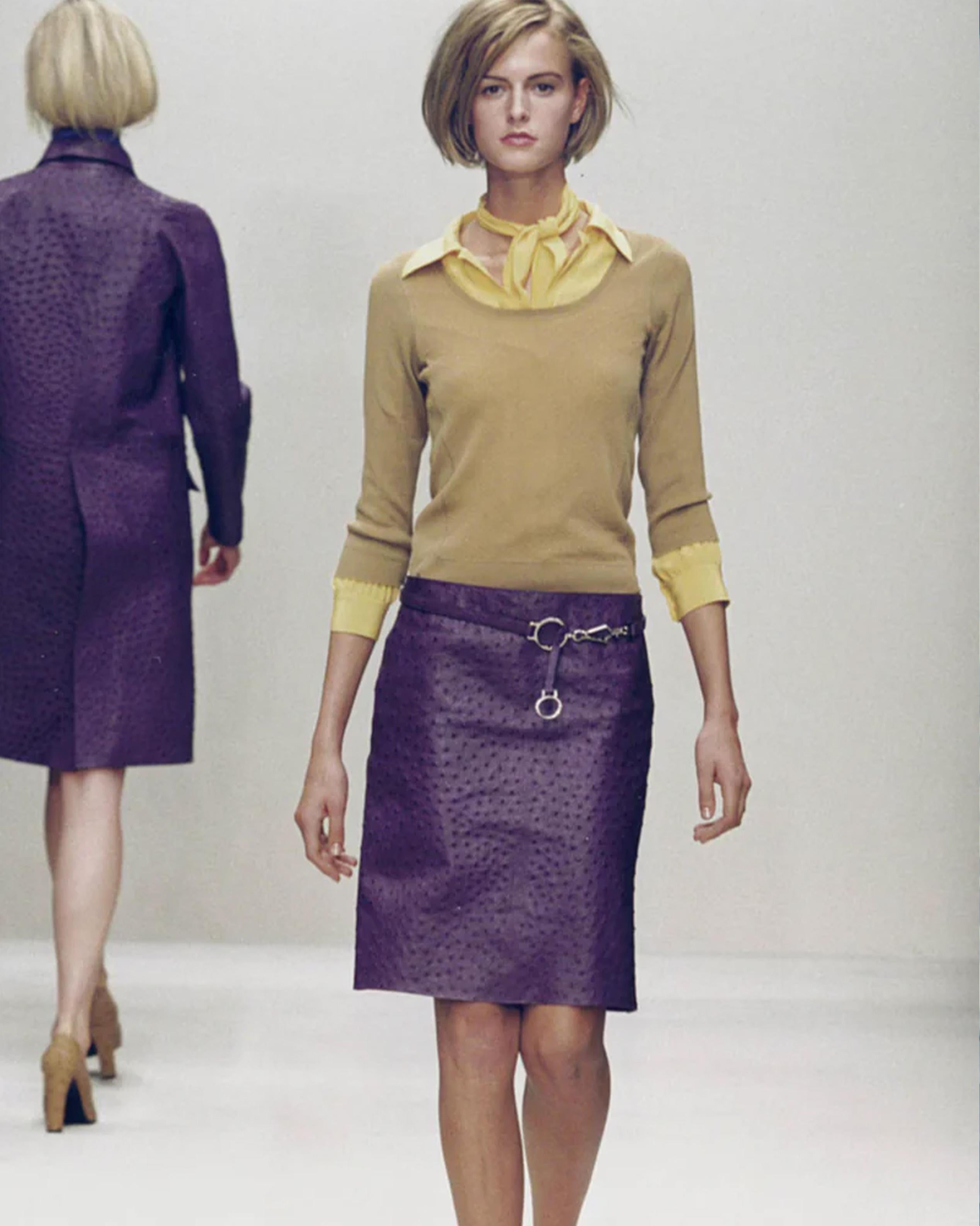- Designed by Miuccia Prada
- Sold by Skof.Archive
- Spring Summer 2000
- Runway Look
- Ostrich Leather Purple Skirt
- Midi Length
- Black dors pattern
- Lateral zip closure
- Materials: 100% Ostrich Leather
- Size: FR 38 - IT 42 - UK 10 - US 8 (EU)