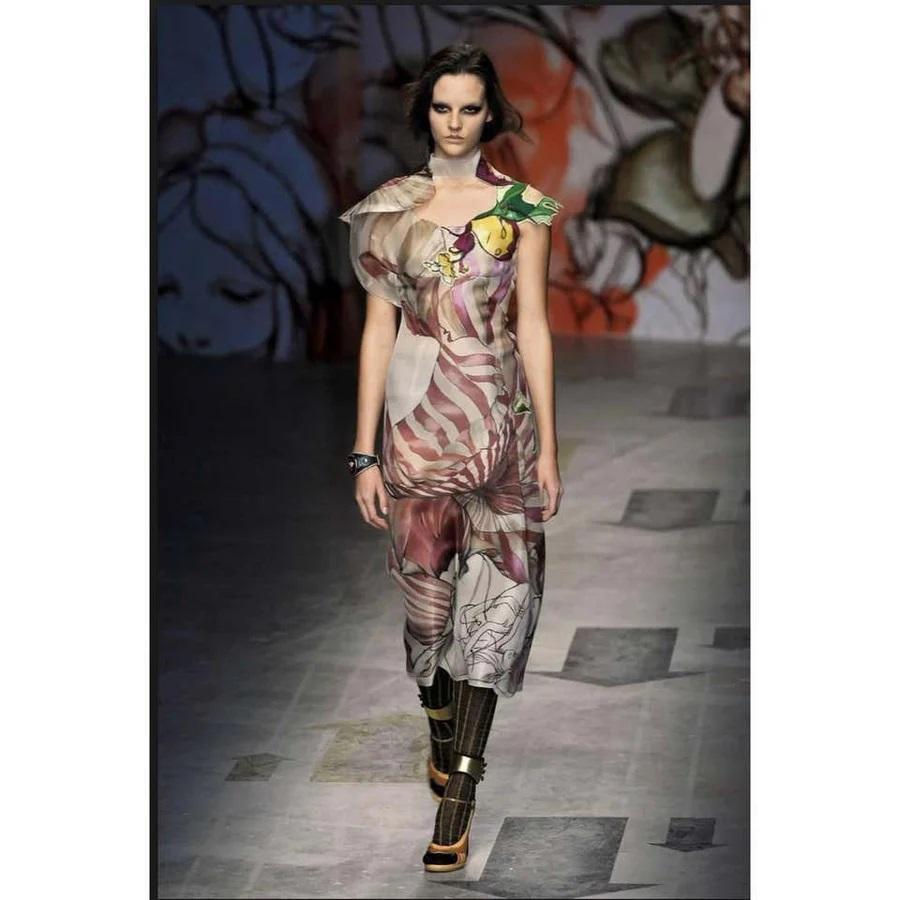 For Prada's Spring/Summer 2008 collection, Miuccia Prada collaborated with Taiwanese-American artist James Jean to create a whimsical, Art Nouveau-inspired collection featuring fairy tale-like prints, resulting in one of Prada's most magical and