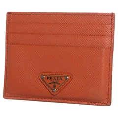 Prada, saffiano leather card holder in orange
