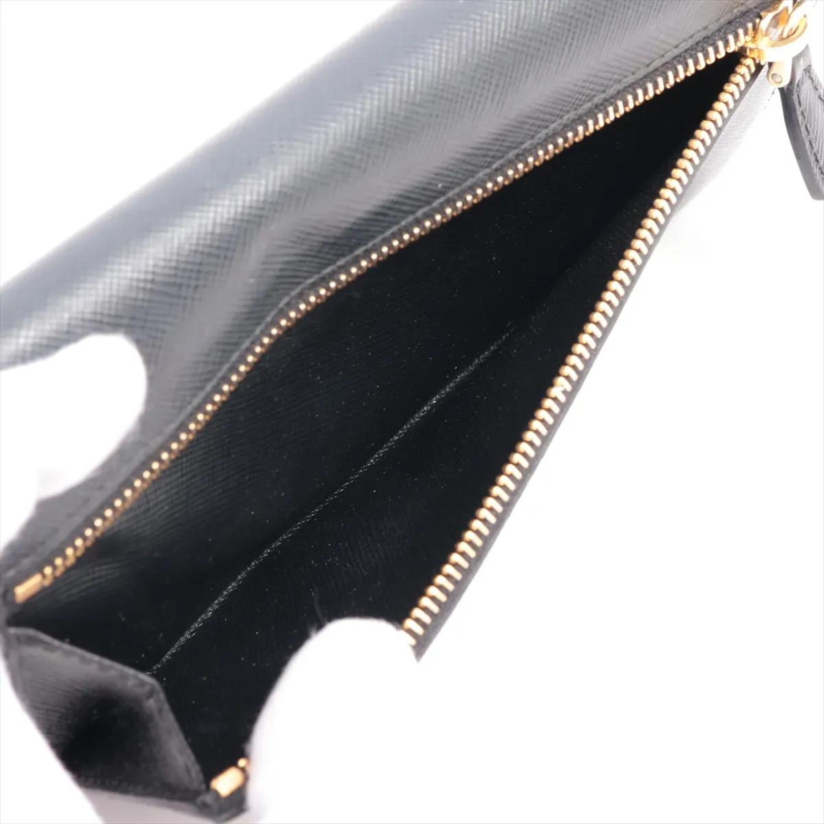 Portafoglio lungo Prada con nastro in pelle saffiano nero in vendita 5