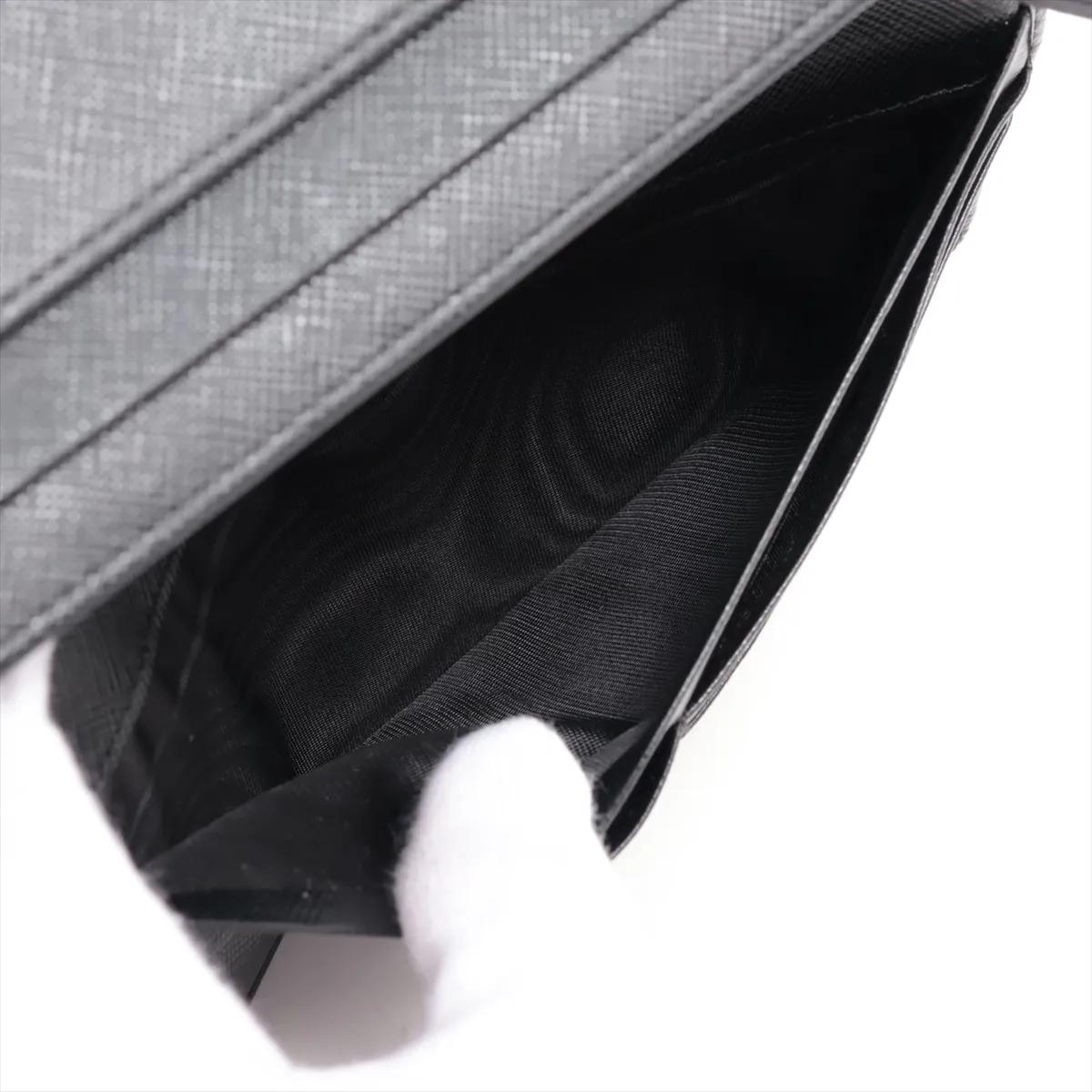 da uomo o donna Portafoglio lungo Prada con nastro in pelle saffiano nero in vendita