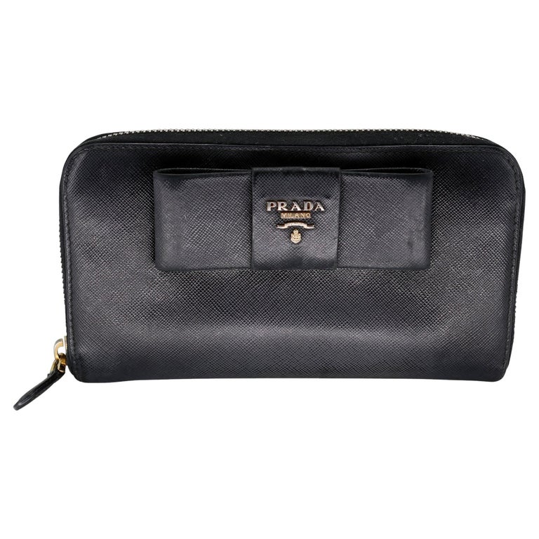 Sold at Auction: PRADA VIOLET LEATHER BOW CONTINENTAL WALLET