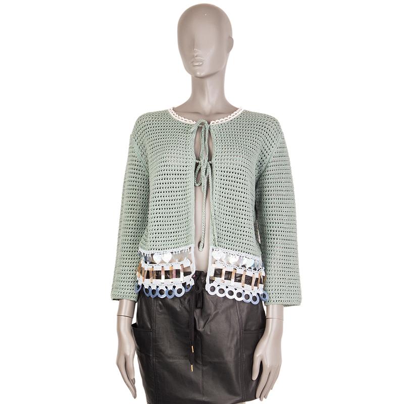 100% authentic Prada embellished-hemline crochet cardigan in sage, light blue and off-white cotton (100%) with acetate sequins in clear iridescent, clear orange and matt. Opens with tie. Has been worn and is in excellent condition.

Measurements
Tag
