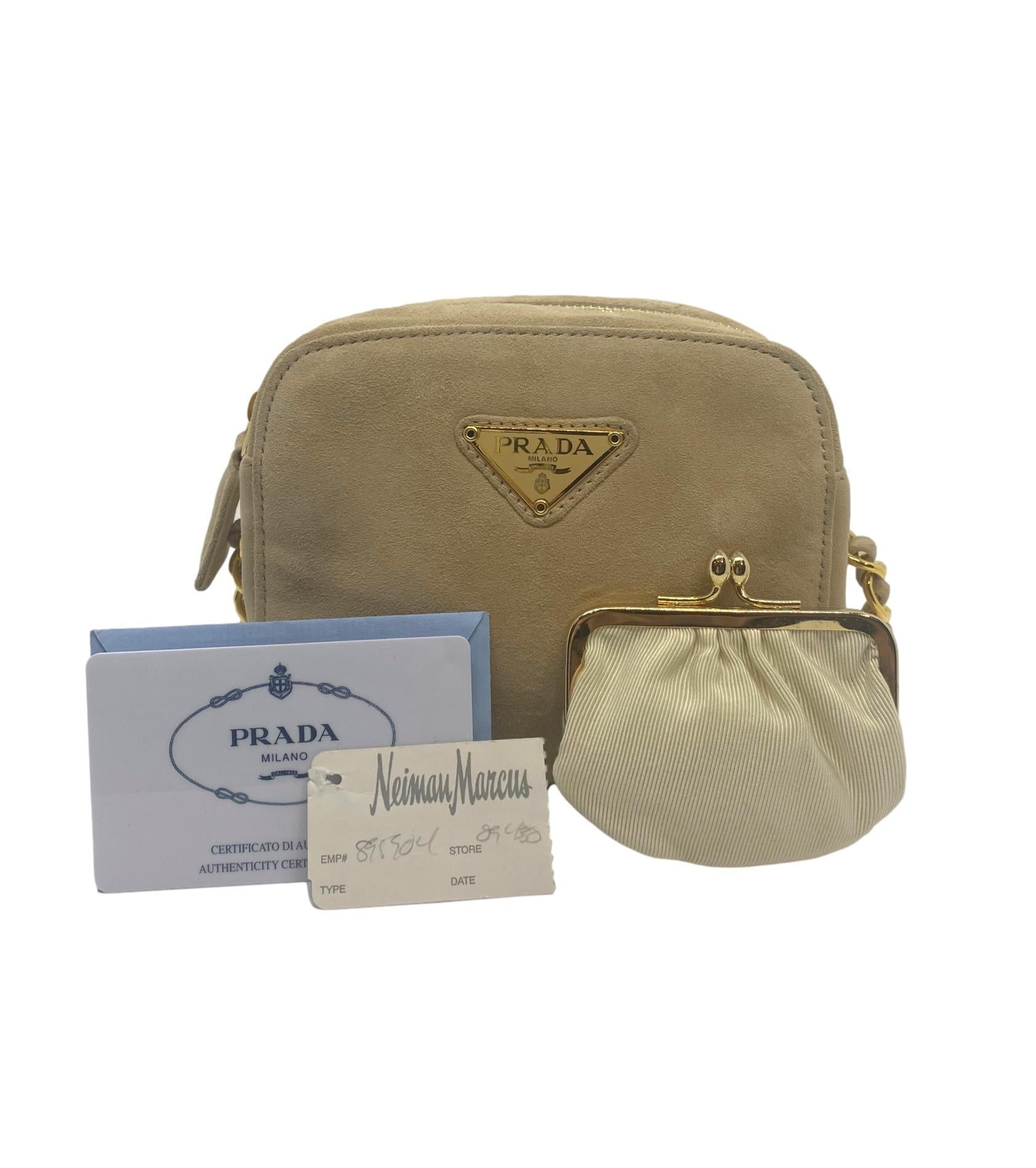 Prada Sand Suede Leather Vintage Mini Crossbody Bag, 2005. Founded by Mario Prada in 1913, Prada's flagship location opened in the Galleria Vittorio Emanuele II in Milan, the world's oldest shopping mall. By 1919, Prada officially became the