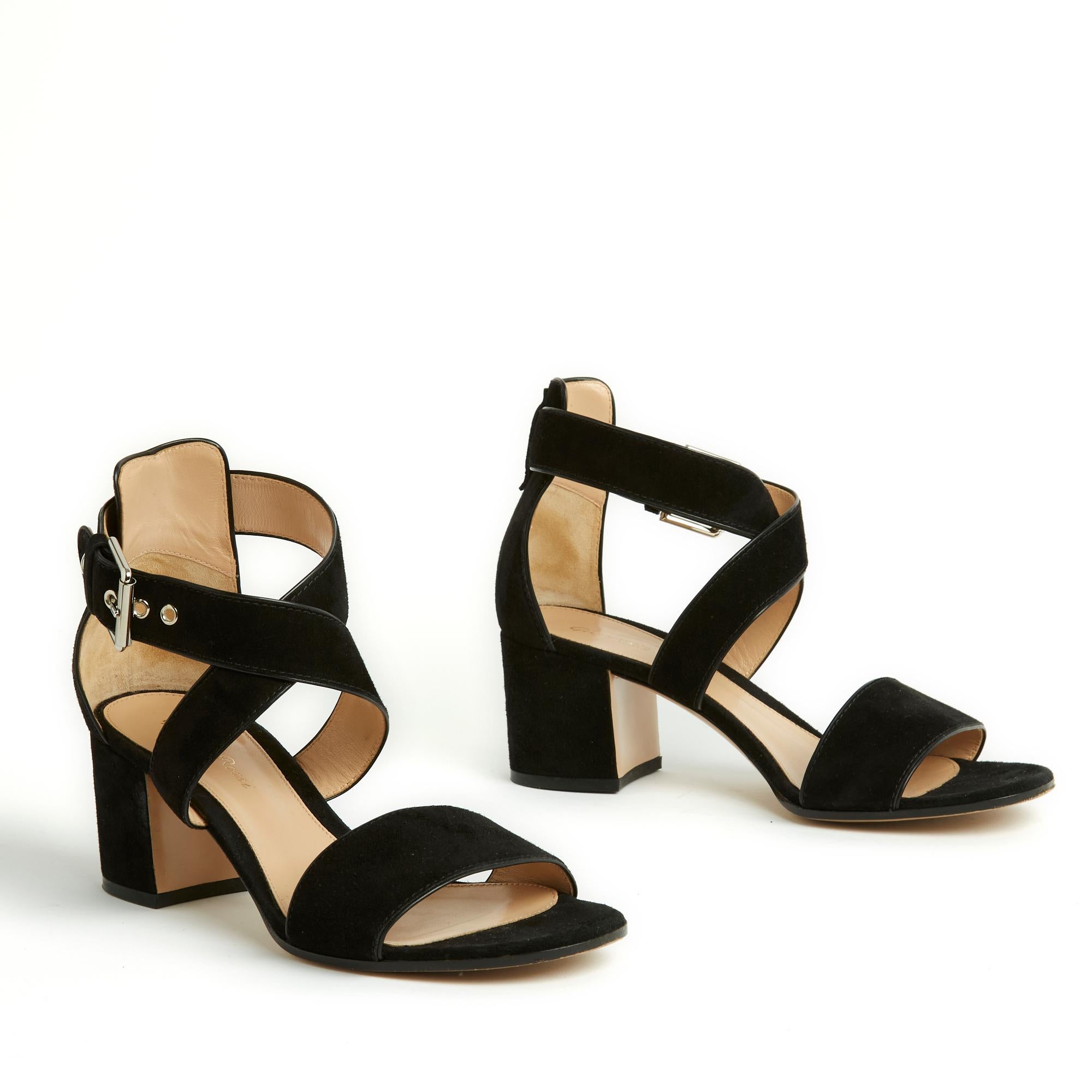 Prada circa 2020 sandals in black suede with wide crossed straps, closed with a silver metal pin buckle, rounded toe, suede-covered heel. Size EU38.5 or UK 5.5 and US8, heel 6 cm, insole 24.7 cm. The sandals have only been worn once indoors and they