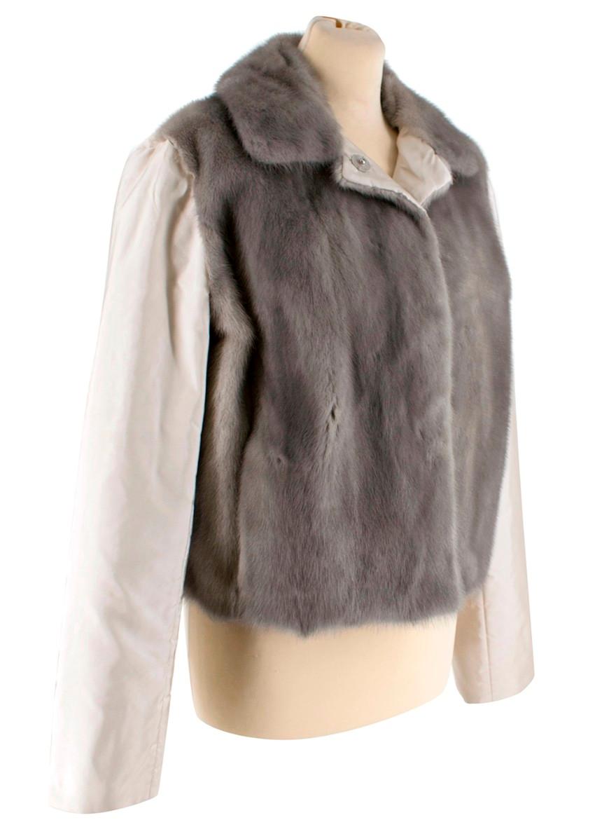 Prada Satin & Mink Fur Paneled Jacket 

- Snap Button Centre Fastening 
- Fully Lined 
- Side Slit Pockets
- Contrast Fabric 
- Mink Collar 
- Light weight 
- Slightly Padded 

Material:
- 100% American Mink Fur
- 100% Silk Insert and Trimming 
-