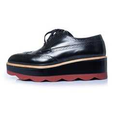 Prada, shiny leather broque platform sneakers