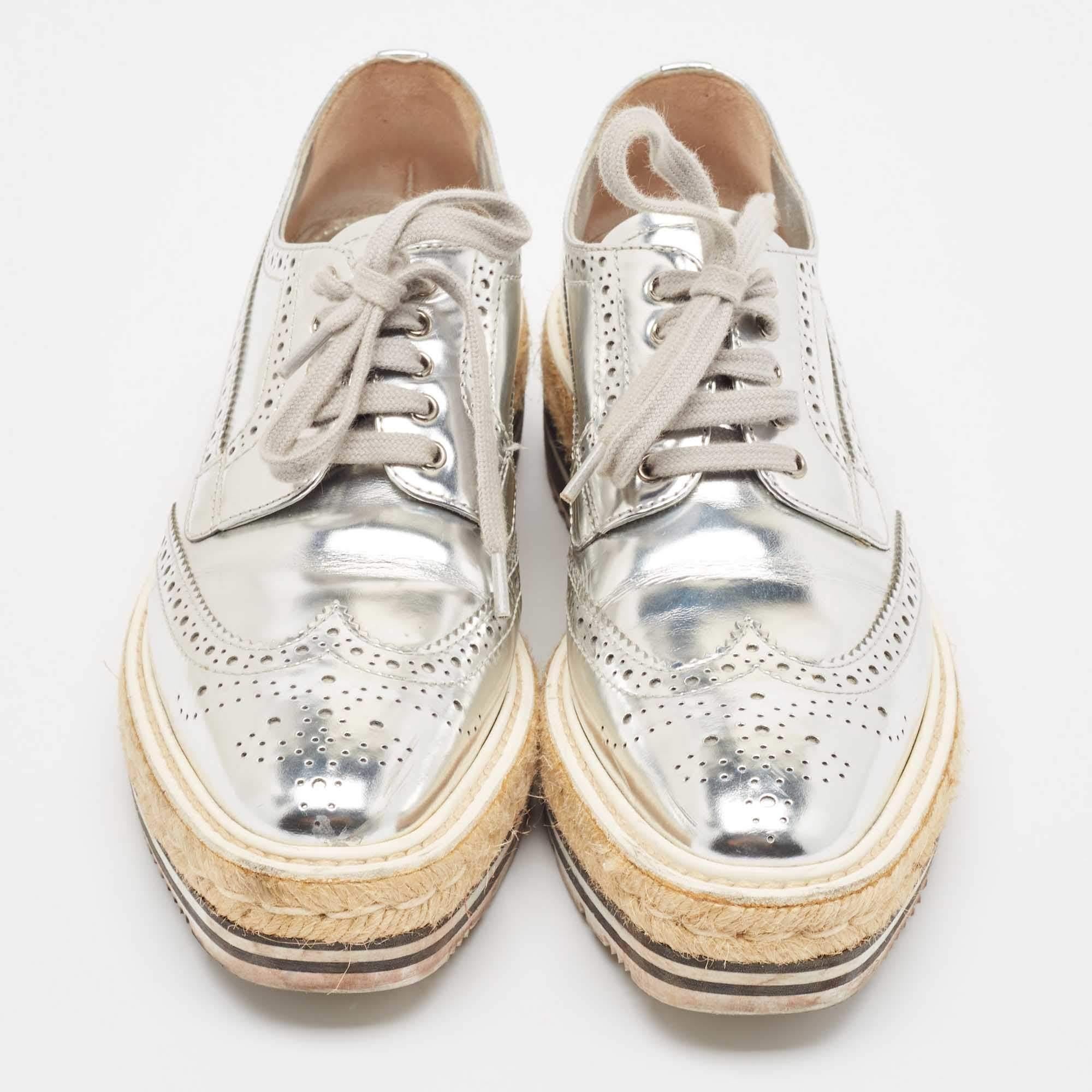 Indulge in luxe comfort with these oxford sneakers from the house of Prada. Featuring lace ups and brogue details they are crafted from leather and finished with rubber soles.