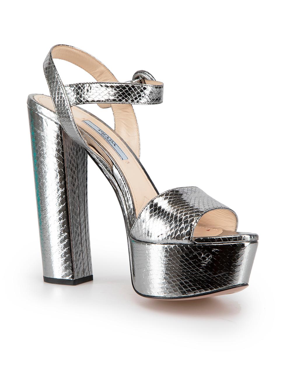 CONDITION is Very good. Minimal wear to platforms is evident. Minimal residue to inner sole, minor discoloured mark on left inner sole and slight indentations to outer heels, front straps and platforms There is also a patch where the leather has