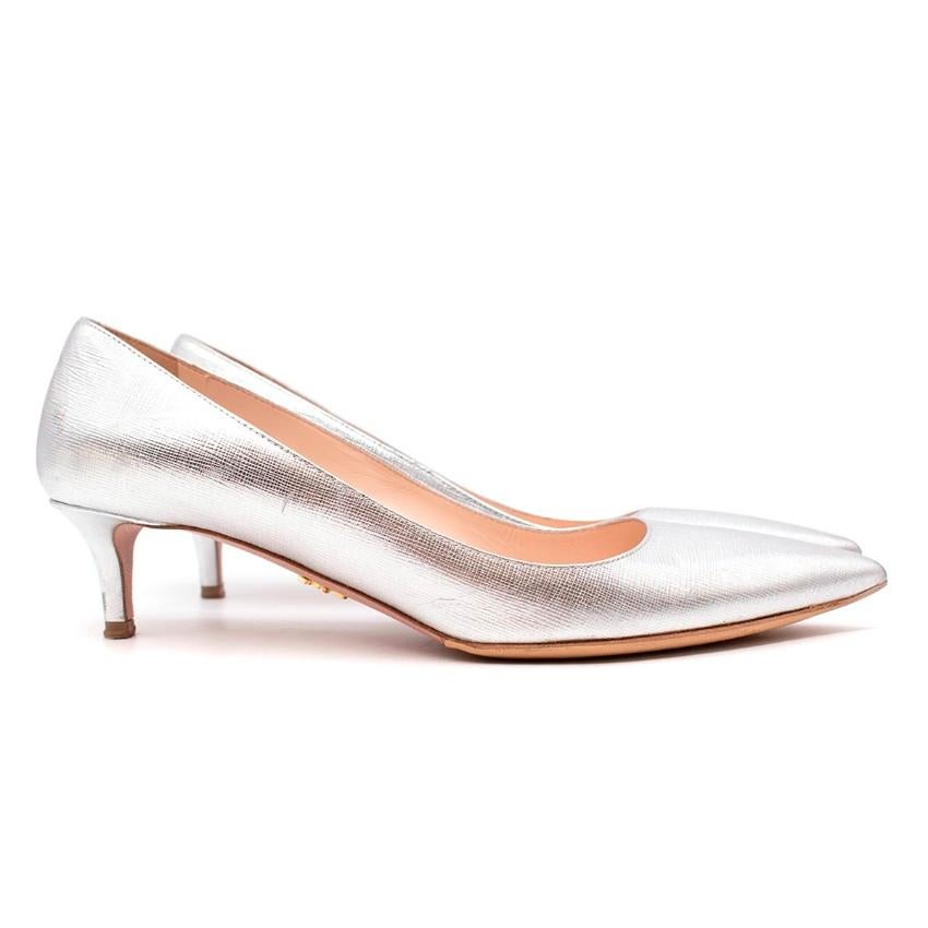  Prada Silver Saffiano Leather Kitten Heel Pumps
 

 - Metallic silver-tone pointed toe pumps
 - Saffiano leather upper
 - Set on a small kitten heel 
 - Great for dressing up a minimal outfit, or adding into your partywear wardrobe
 

 Materials:
