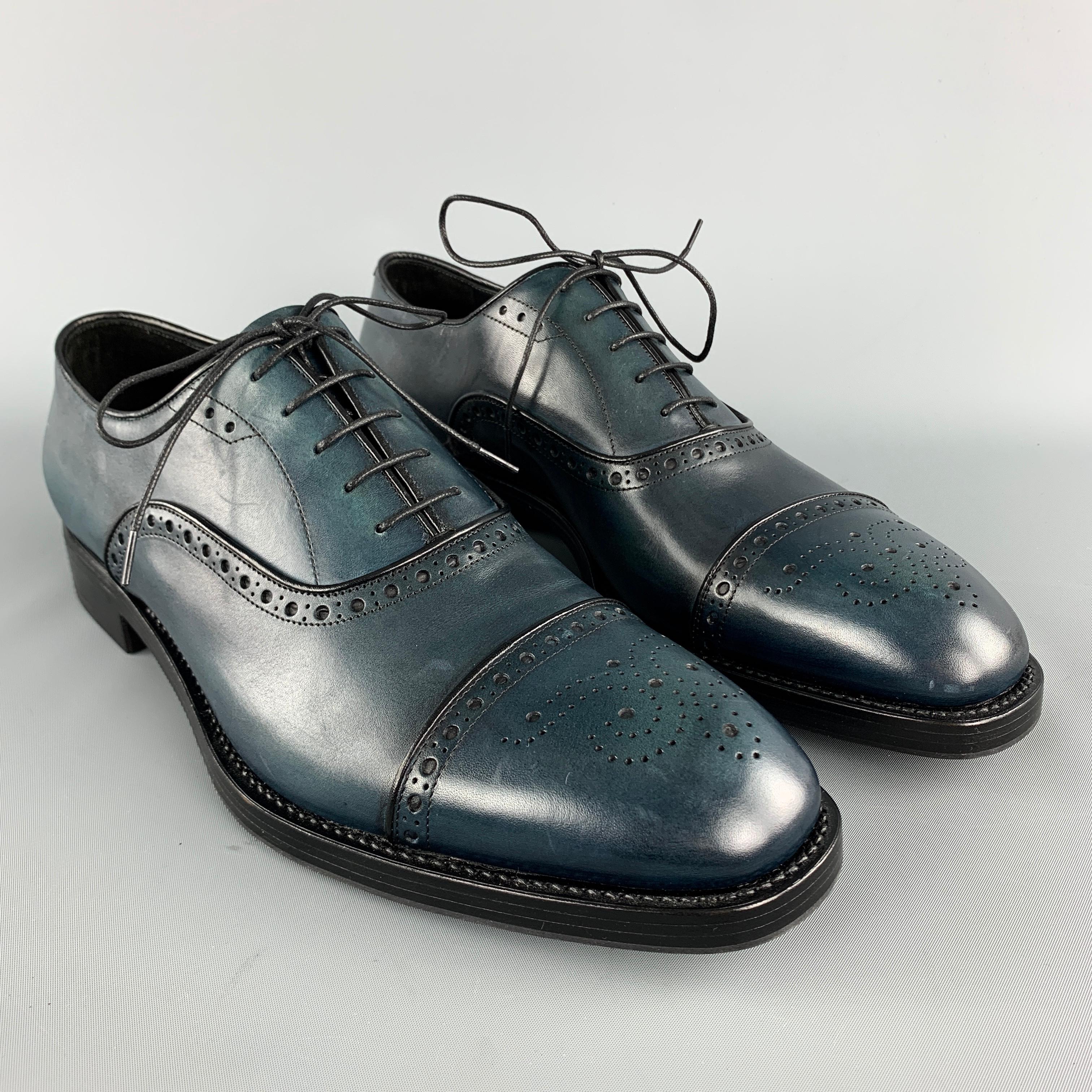PRADA oxford lace up shoes comes in blue tones in leather material, featuring an antique style, a cap toe, and inner and outsole in leather. Worn once. Made in Italy.

Excellent Pre-Owned Condition.
Marked: UK 10 2EA135  

Outsole: 12.5 x 4.2 in. 