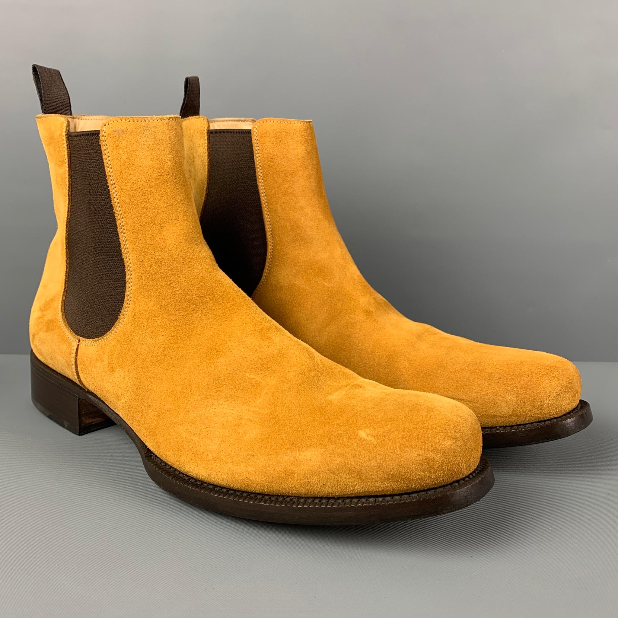 PRADA boots comes in a natural suede featuring a chelsea style and a round toe. Includes box. Made in Italy. 

Very Good Pre-Owned Condition.
Marked: 11

Measurements:

Length: 13 in.
Width: 4.25 in.
Height: 6.25 in. 