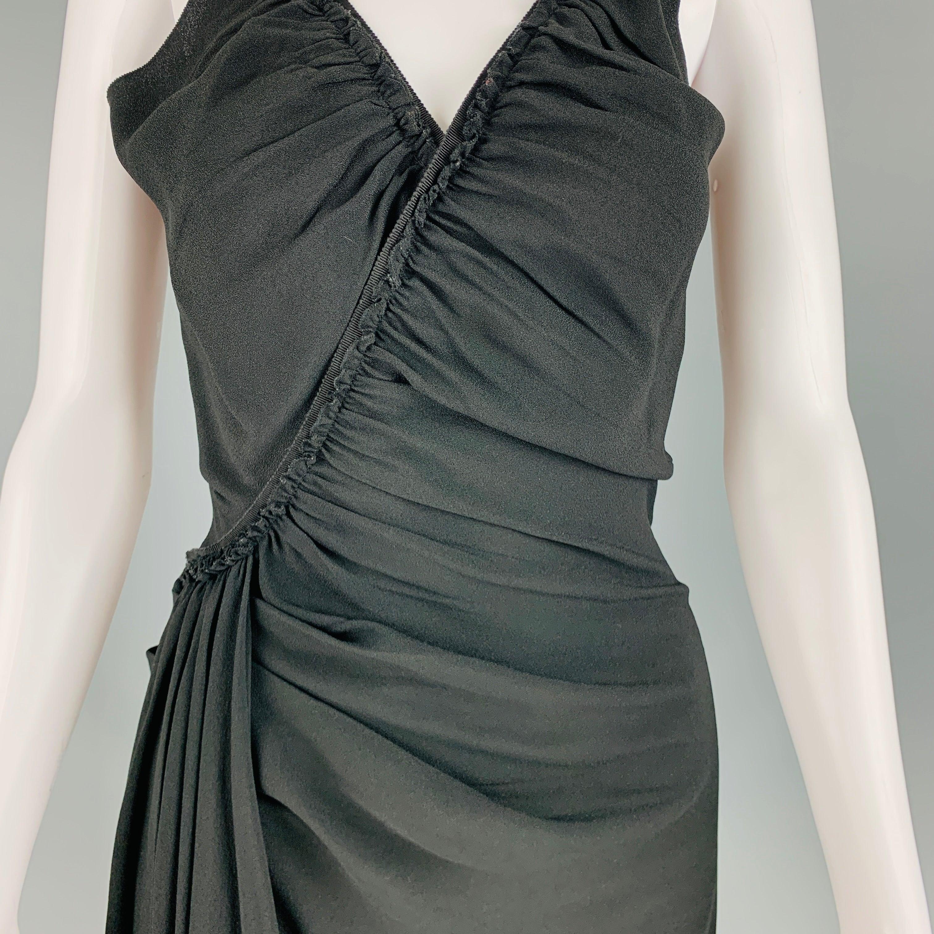 PRADA dress comes in a black acetate and viscose woven material featuring a Spaghetti strap, rushed design, asymmetrical hem, lace trim, and a side zip up closure. Very Good Pre-Owned Condition. Moderate signs of wear 

Marked:   38 

Measurements: