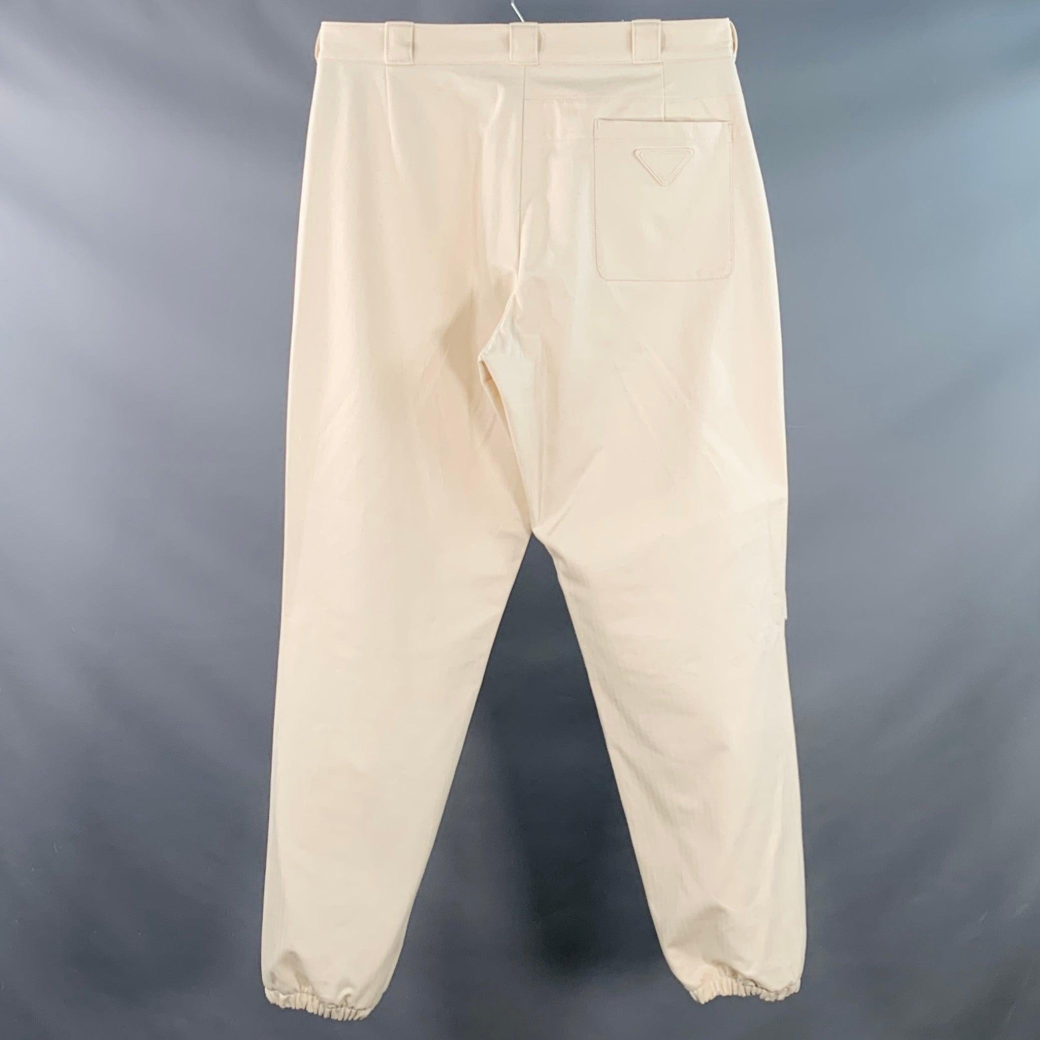 PRADA Size 36 Beige Cotton Herringbone Tapered Elastic Cuffs Zip Fly Casual Pants In Good Condition For Sale In San Francisco, CA