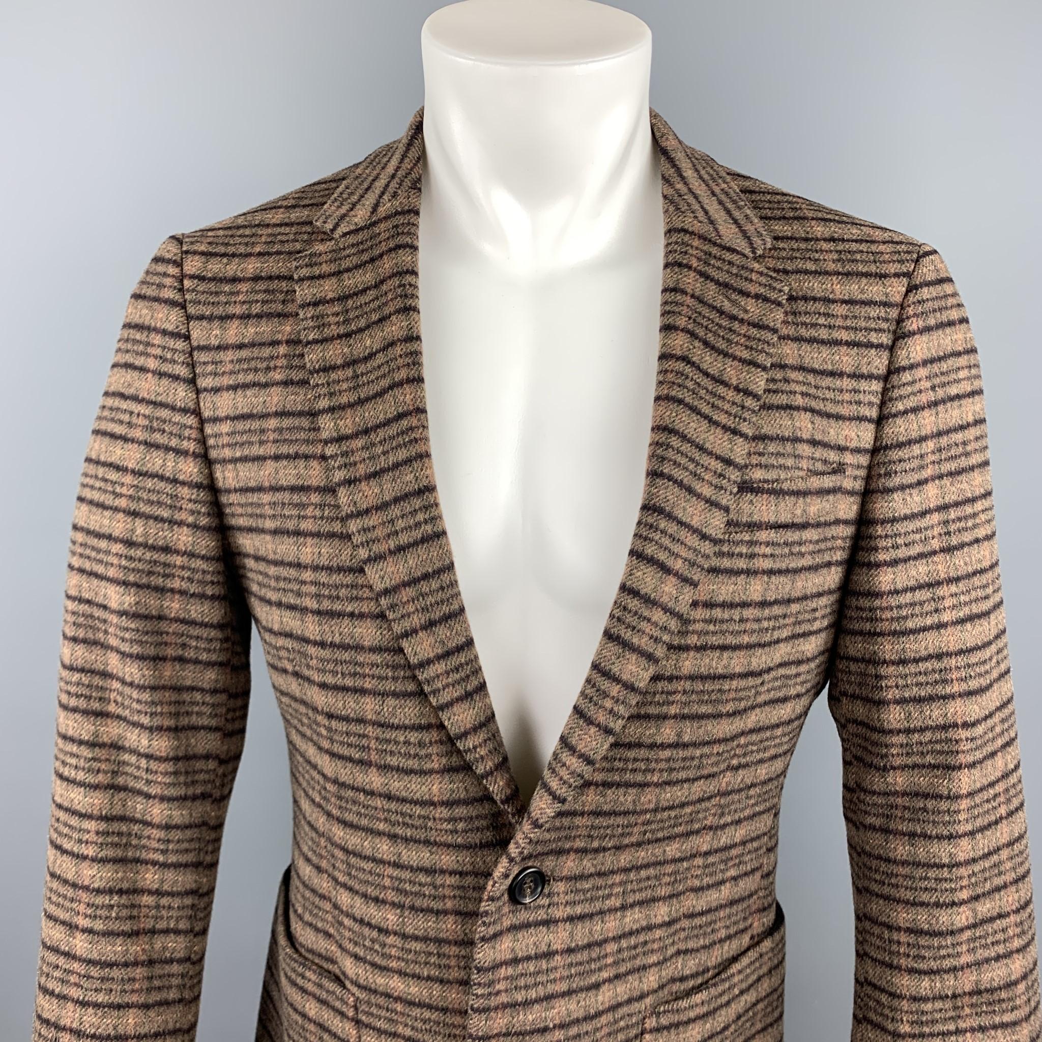 PRADA sport coat comes in a brown plaid lana wool / alpaca featuring a notch lapel style, patch pockets, and a two button closure. Made in Italy.

Excellent Pre-Owned Condition.
Marked: 48 R

Measurements:

Shoulder: 15.5 in. 
Chest: 38 in. 
Sleeve: