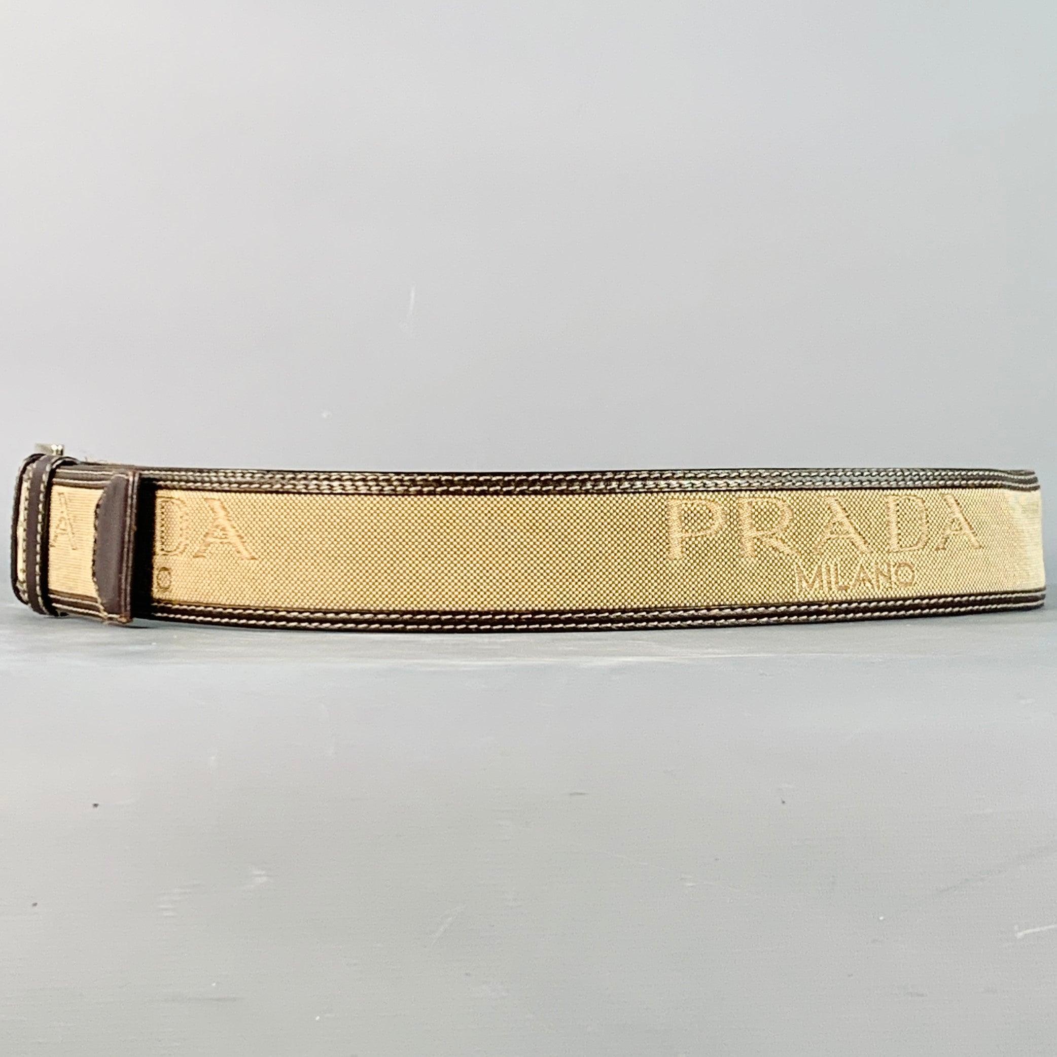 Uomo Prada Taglia 38 Cintura in pelle canvas marrone con logo, marrone e marrone. in vendita