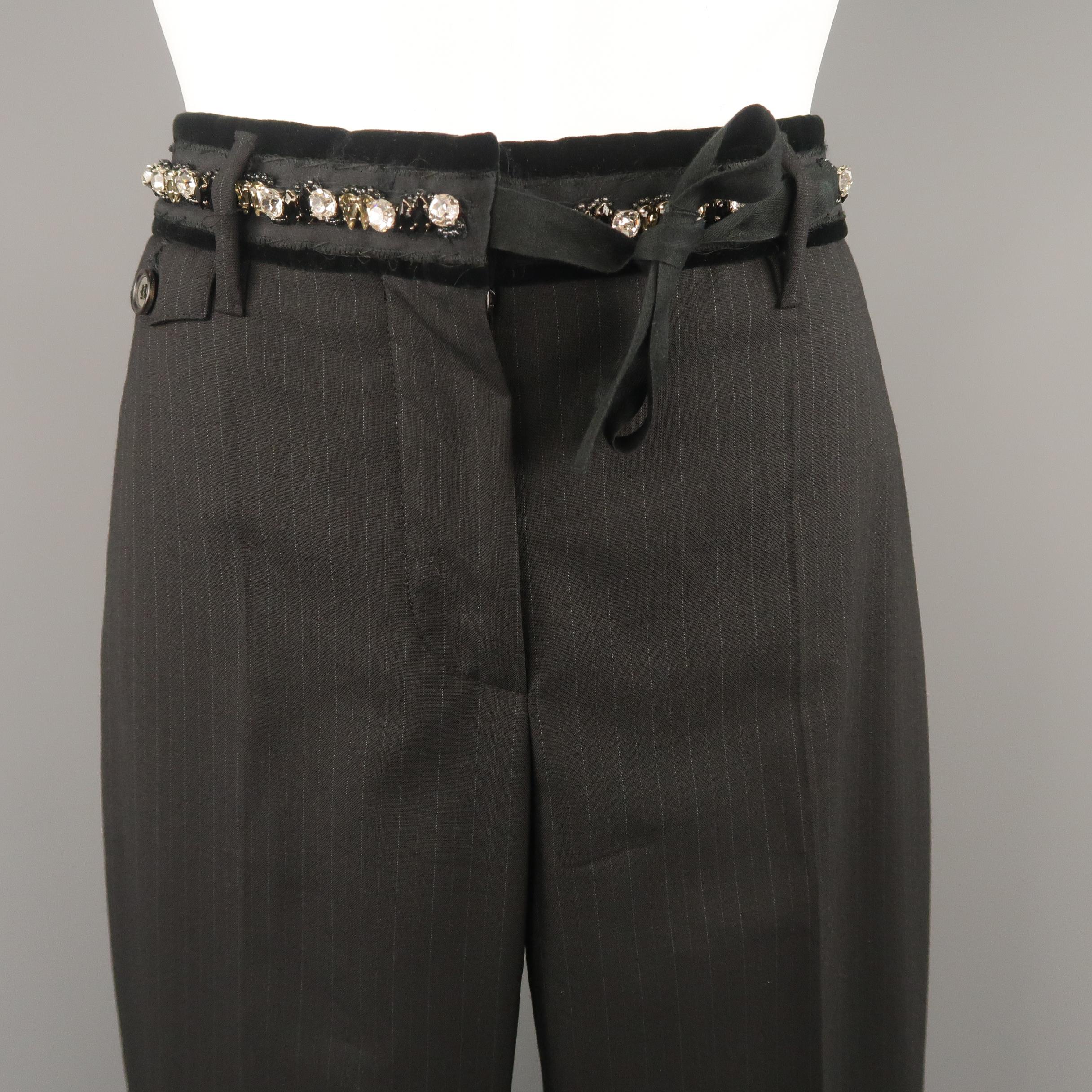 PRADA dress pants come in pinstriped virgin wool with a straight leg and rhinestone studded, velvet trimmed tie waistband. Made in Italy.
 
Excellent Pre-Owned Condition.
Marked: IT 40
 
Measurements:
 
Waist: 30 in.
Rise: 9.5 in.
Inseam: 34 in.