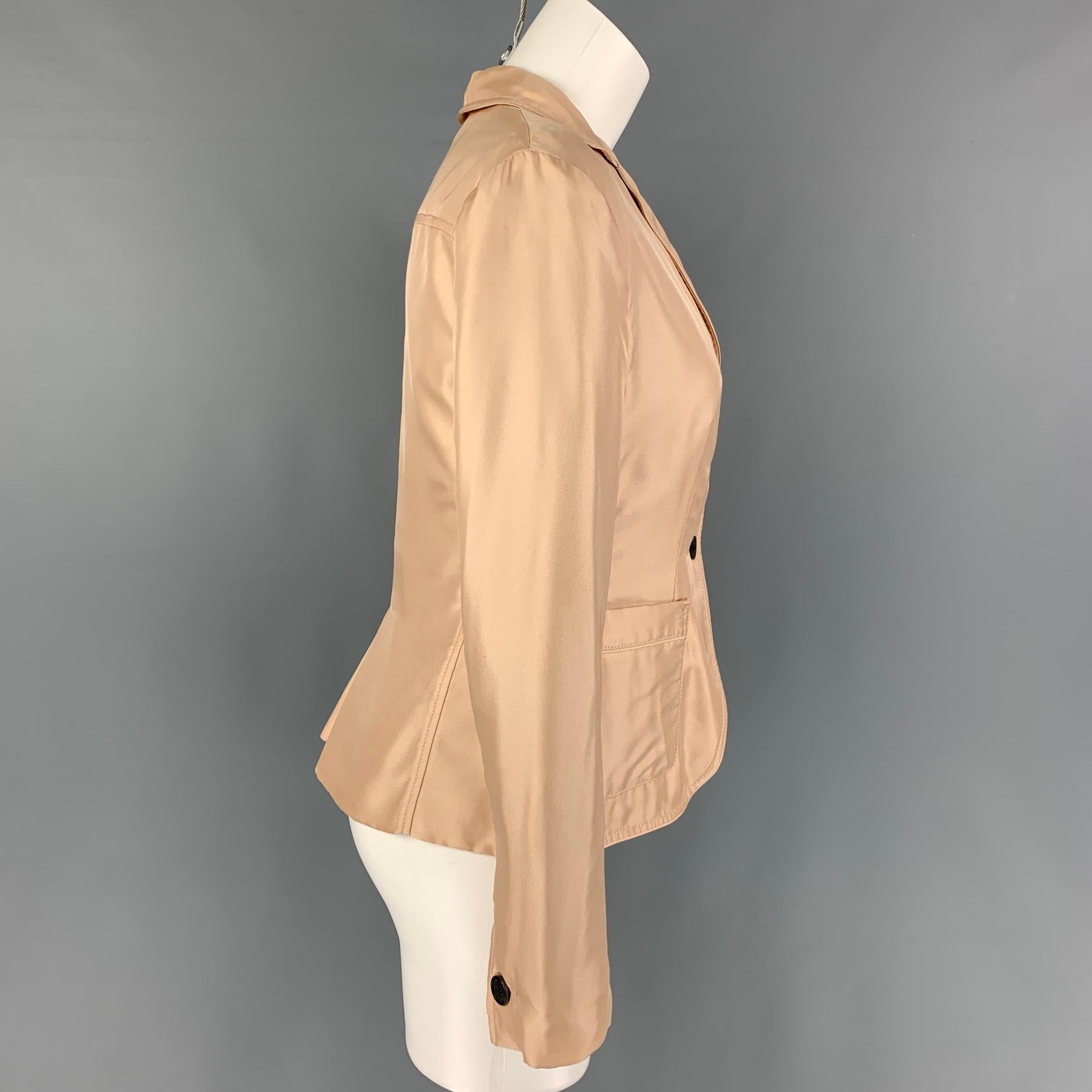 PRADA jacket comes in a blush silk featuring a notch lapel, patch pockets, single back vent, and a three button closure. Made in Italy. 

Good Pre-Owned Condition. Light marks at back. As-Is.
Marked: 40

Measurements:

Shoulder: 16 in.
Bust: 36