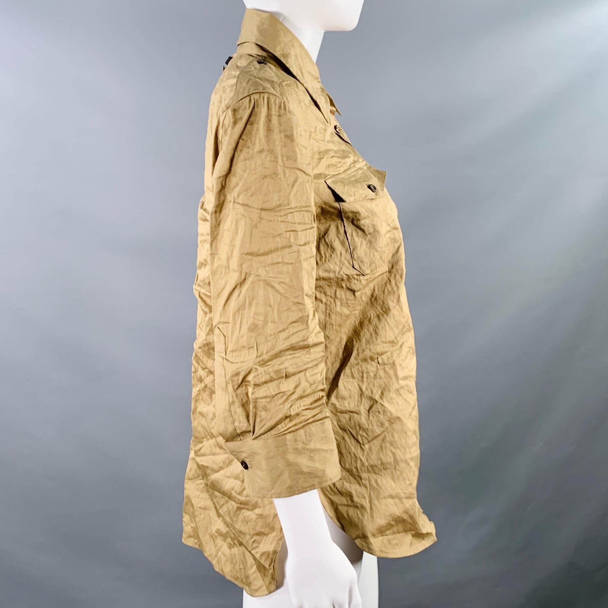 PRADA shirt
in a khaki cotton blend fabric featuring a wrinkled design, two buttoned pockets, and button closure. Made in Italy.Excellent Pre-Owned Condition. 

Marked:   IT 40 

Measurements: 
 
Shoulder: 16 inches Bust: 38 inches Sleeve: 18 inches