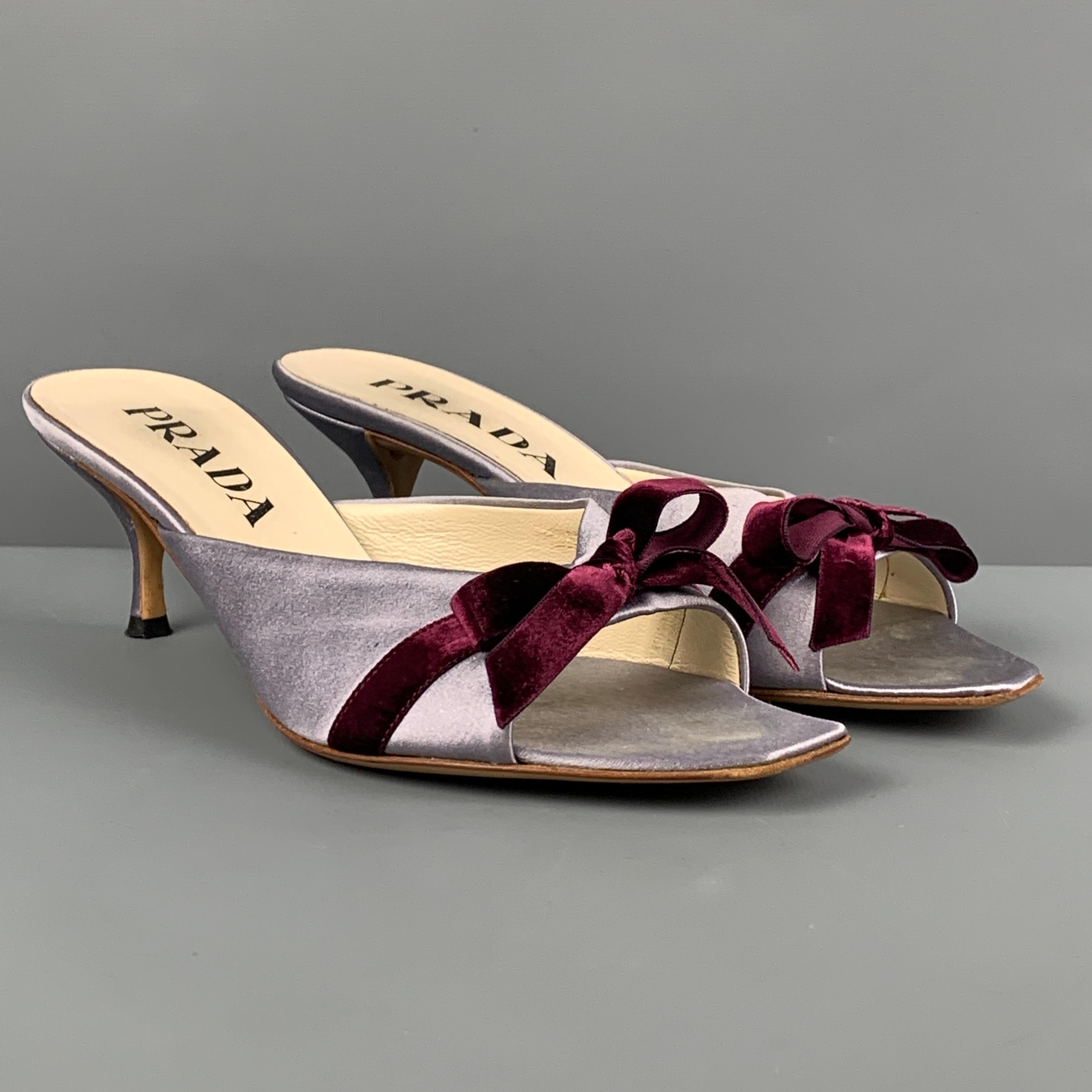 PRADA sandals comes in a lavender silk featuring a open toe, front bow detail, and a kitten heel. Made in Italy. 

Good Pre-Owned Condition. Light wear.
Marked: 35.5

Outsole: 2.25 in. 
