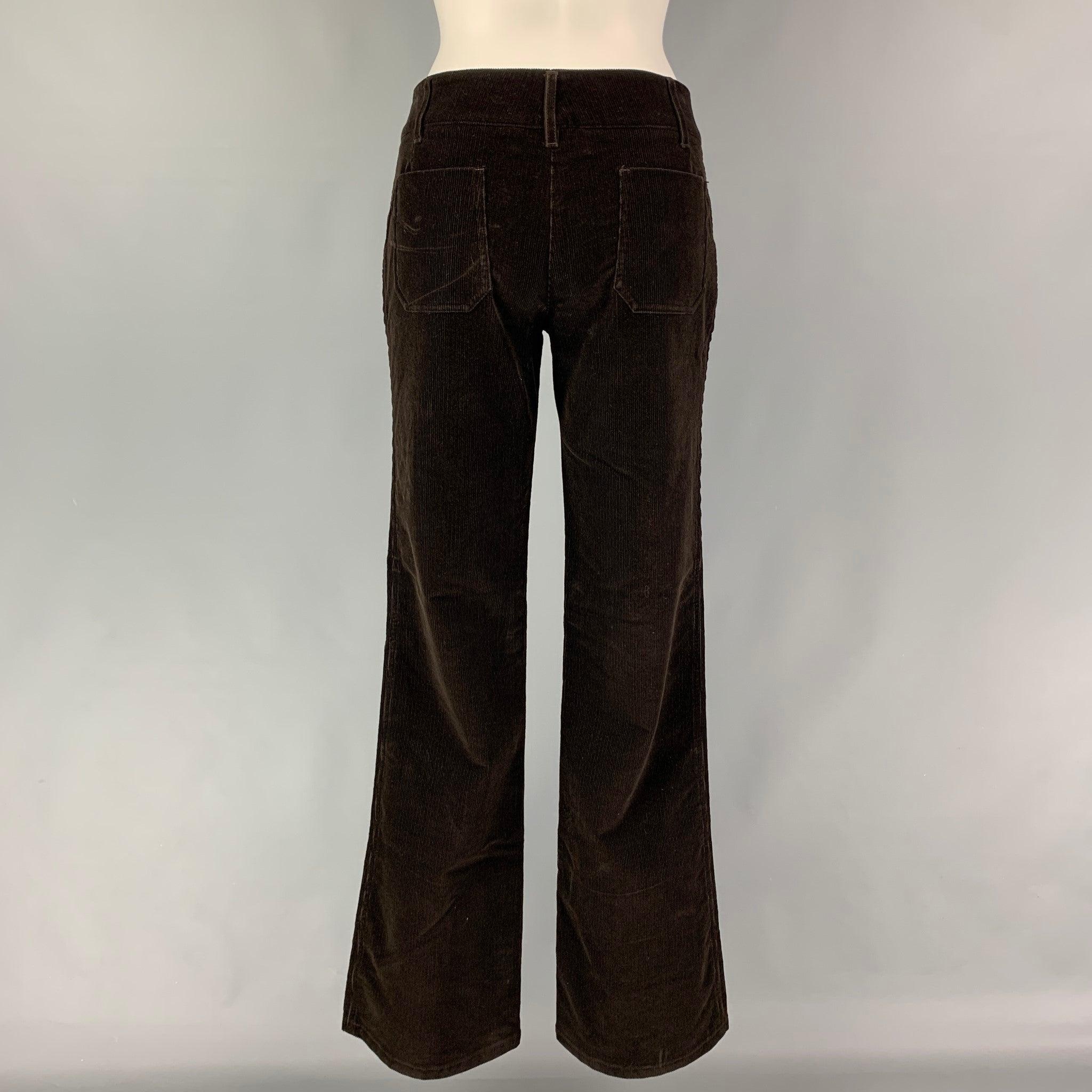 PRADA casual pants comes in a brown corduroy featuring a flat front and a button fly closure. Made in Italy.
Very Good
Pre-Owned Condition. 

Marked:   42 

Measurements: 
  Waist: 32 inches  Rise: 9 inches  Inseam: 34 inches 
  
  
 
Reference: