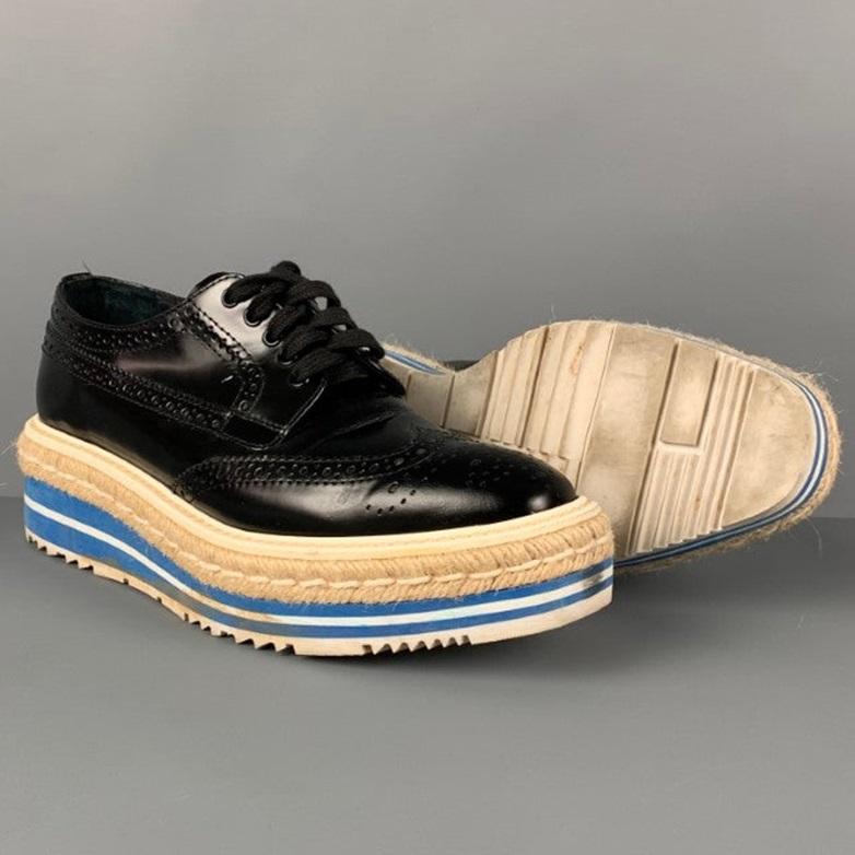 PRADA Size 6.5 Black White Blue Perforated Wingtip Shoes In Good Condition For Sale In San Francisco, CA