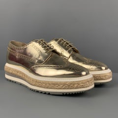 PRADA Size 6.5 Gold Leather Perforated Wingtip Lace Up Shoes