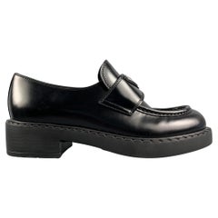 PRADA Size 7.5 Black Leather Triangle Logo Loafers