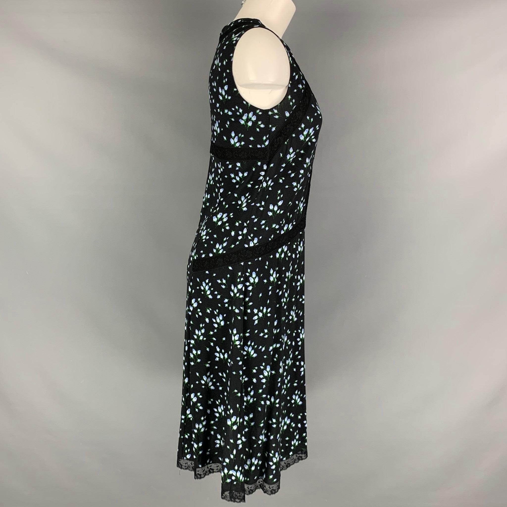 PRADA dress comes in a black, blue and green floral viscose and elastane woven material featuring a black lace details, V-neck, and a sleeveless style. Excellent Pre-Owned Condition. 

Marked:  38 

Measurements: 
 Bust: 34 inches Waist: 32 inches