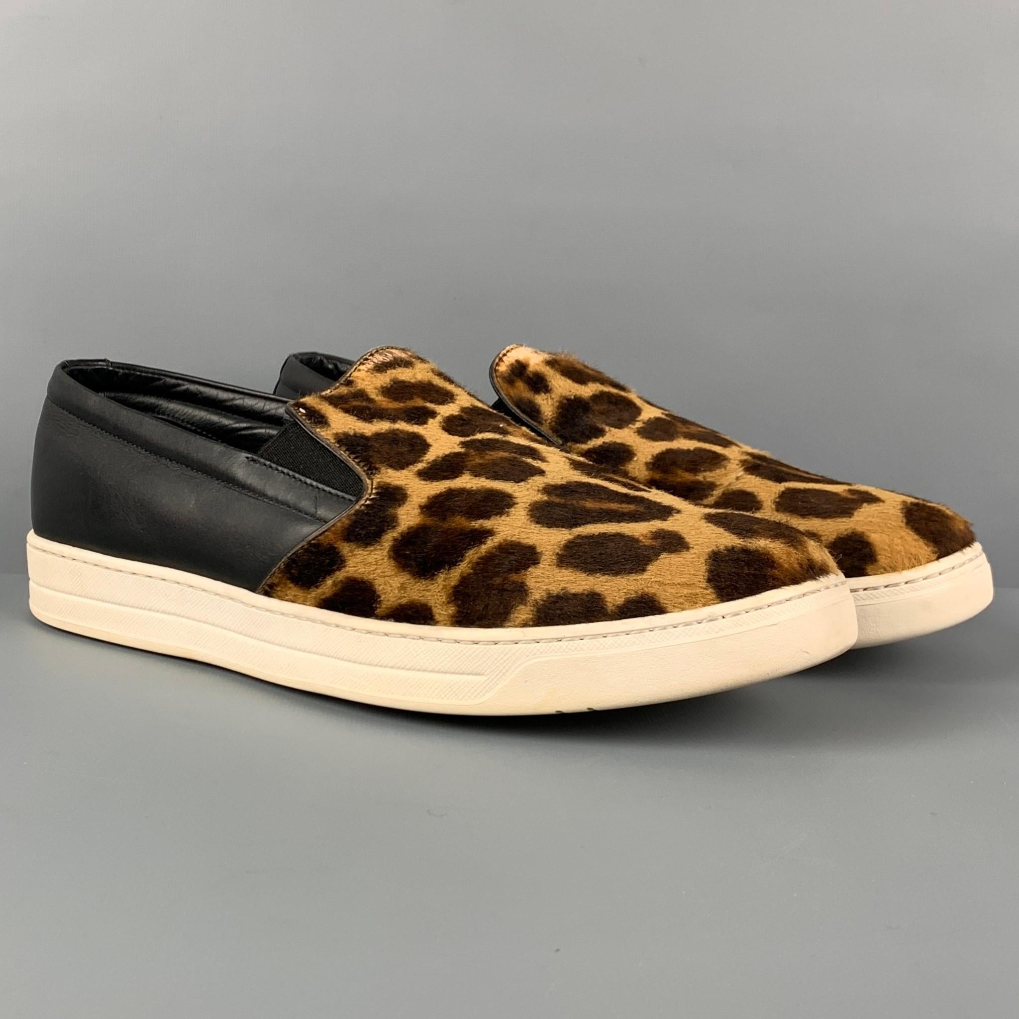 PRADA loafers comes in a brown & black animal print pony hair with a leather panel featuring a slip on style and a rubber sole. 

Very Good Pre-Owned Condition.
Marked: 8.5

Outsole: 11.75 in. x 4.25 in. 