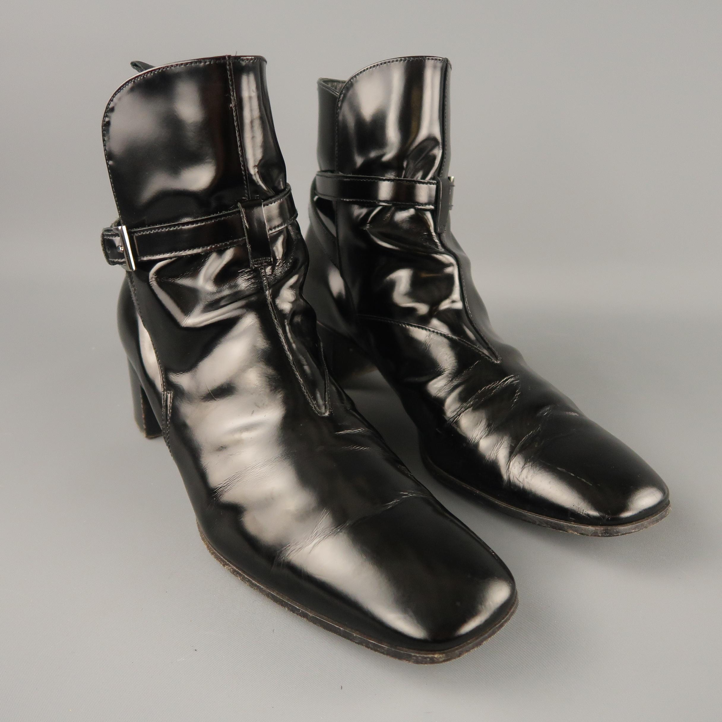 PRADA ankle boots comes in a black leather, wrap around strap details, and wooden heel. Made in Italy.
 
Excellent Pre-Owned Condition.
Marked: UK 8.5
 
Measurements:
 
Length: 12 in.
Width: 4.2 in.
Height: 8 in.