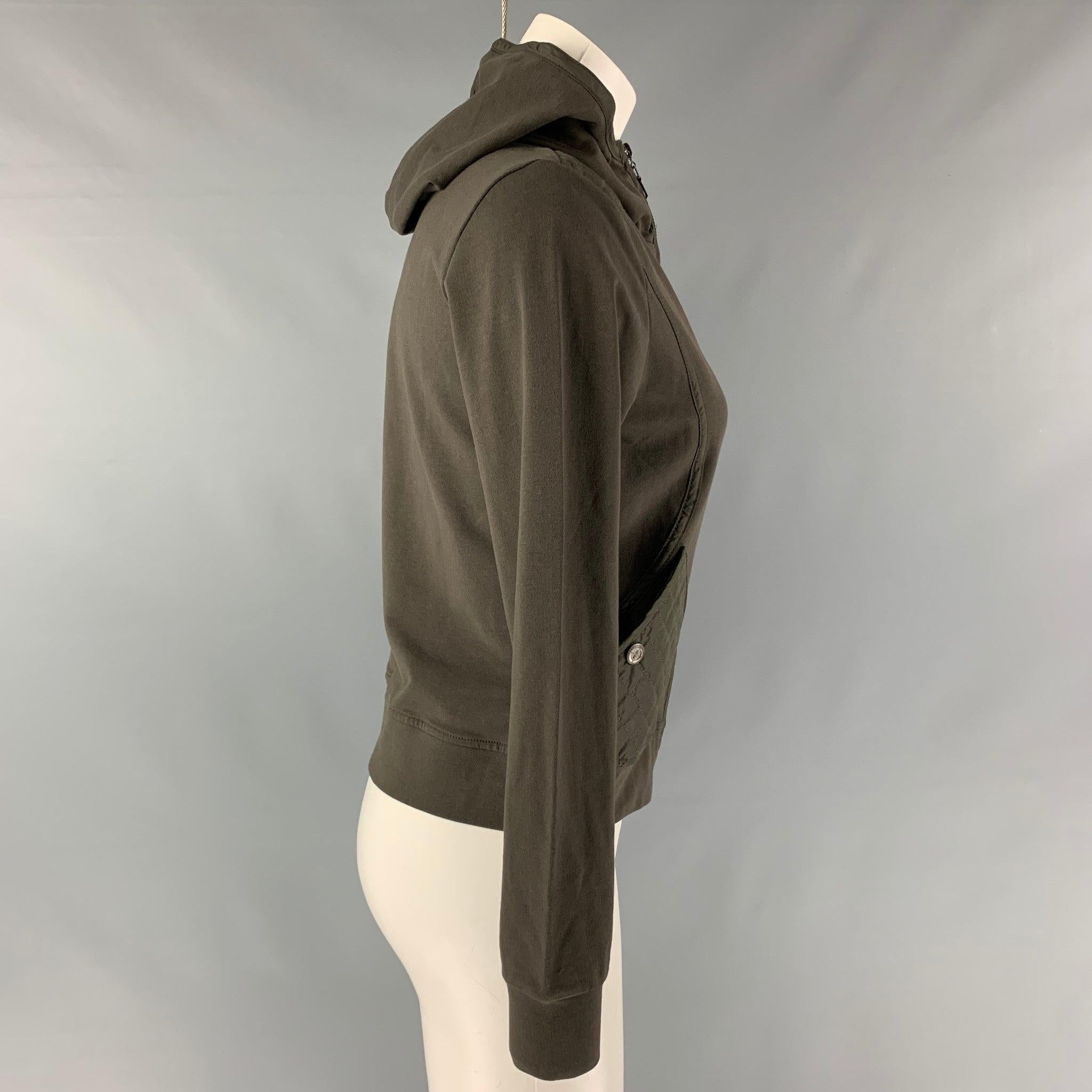 PRADA SPORT casual long sleeve top comes in a olive french terry knit fabric featuring a zip up closure, quilted details and a hoodie.Good Pre-Owned Condition. Moderate signs of wear and moderate marks. As Is. 
 

 Marked:  L 
 

 Measurements: 
  
