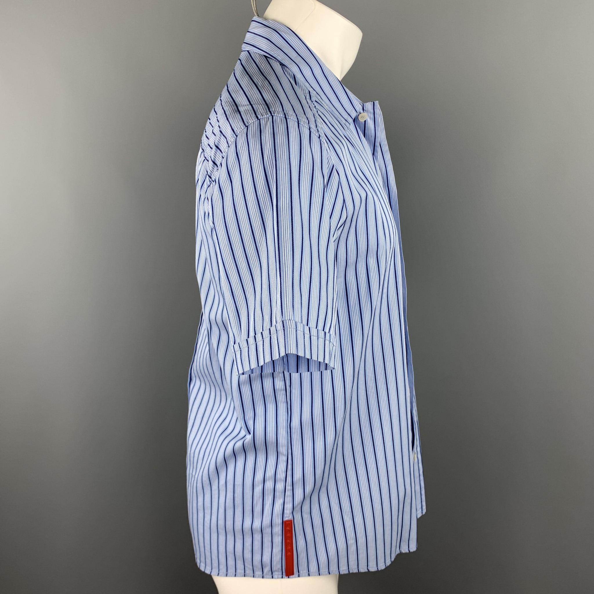 PRADA short sleeve shirt comes in a blue stripe cotton featuring a button up style and a spread collar. Made in Italy.

Excellent Pre-Owned Condition.
Marked: M

Measurements:

Shoulder: 18 in.
Chest: 42 in. 
Sleeve: 9 in. 
Length: 28 in. 