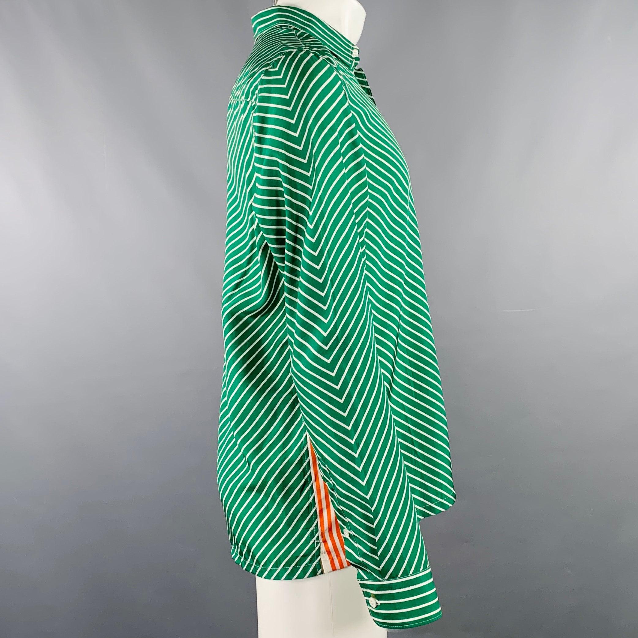 PRADA long sleeve shirt
in a green and white woven silk featuring a stripe pattern with orange side stripe details, one pocket, and button closure. Made in Italy.Excellent Pre-Owned Condition. 

Marked:   40/15.75 

Measurements: 
 
Shoulder: 16.5