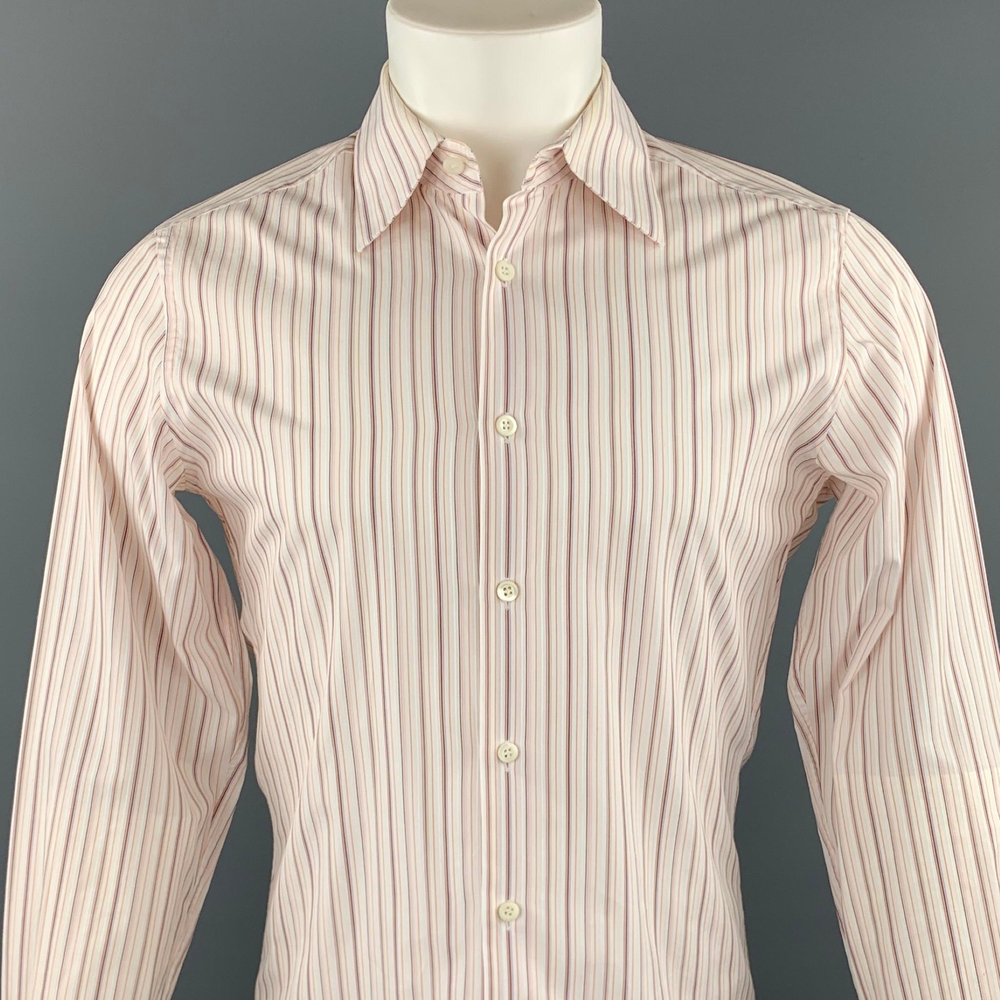 PRADA long sleeve shirt comes in a white stripe cotton featuring a button up style and a spread collar. Minor discoloration on collar. Made in Italy.

Good Pre-Owned Condition.
Marked: 40/15.5

Measurements:

Shoulder: 16 in. 
Chest: 40 in. 
Sleeve: