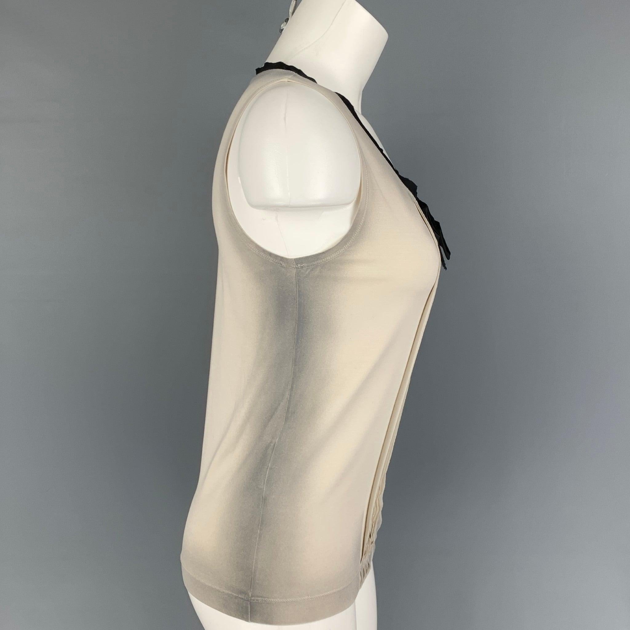 PRADA dress top comes in a beige & black ombre silk featuring a front pleated design, sleeveless, and a front bow detail. Made in Italy.
Very Good
Pre-Owned Condition. 

Marked:   S 

Measurements: 
 
Shoulder: 12 inches  Bust: 31 inches  Length: 22